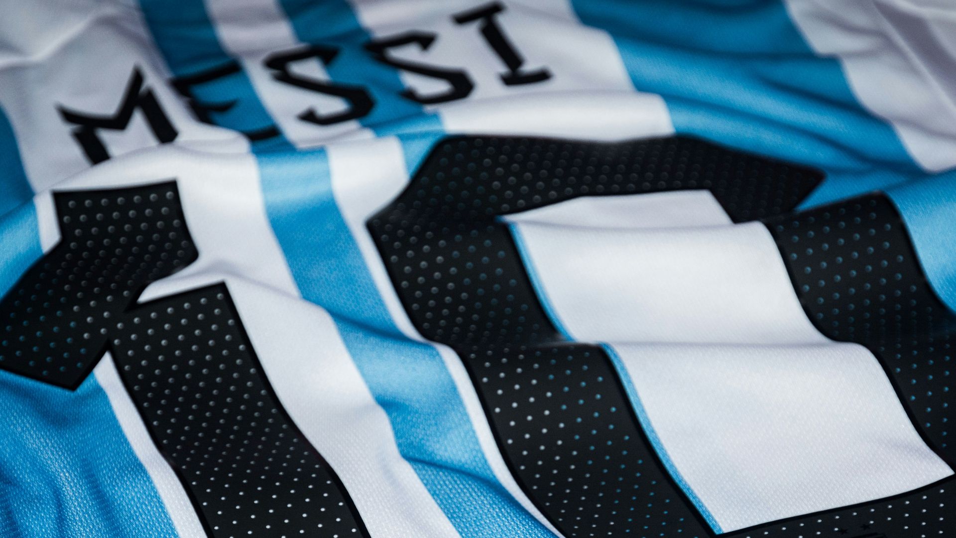 a close up of a soccer jersey with the number ten on it
