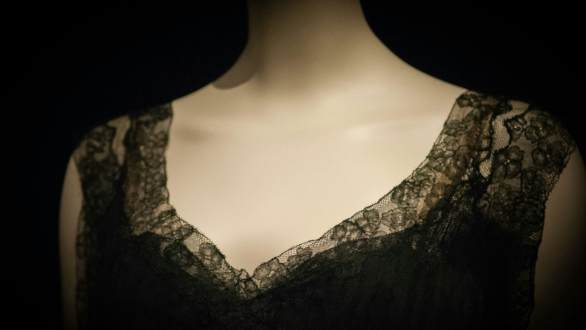 woman in black lace v neck shirt