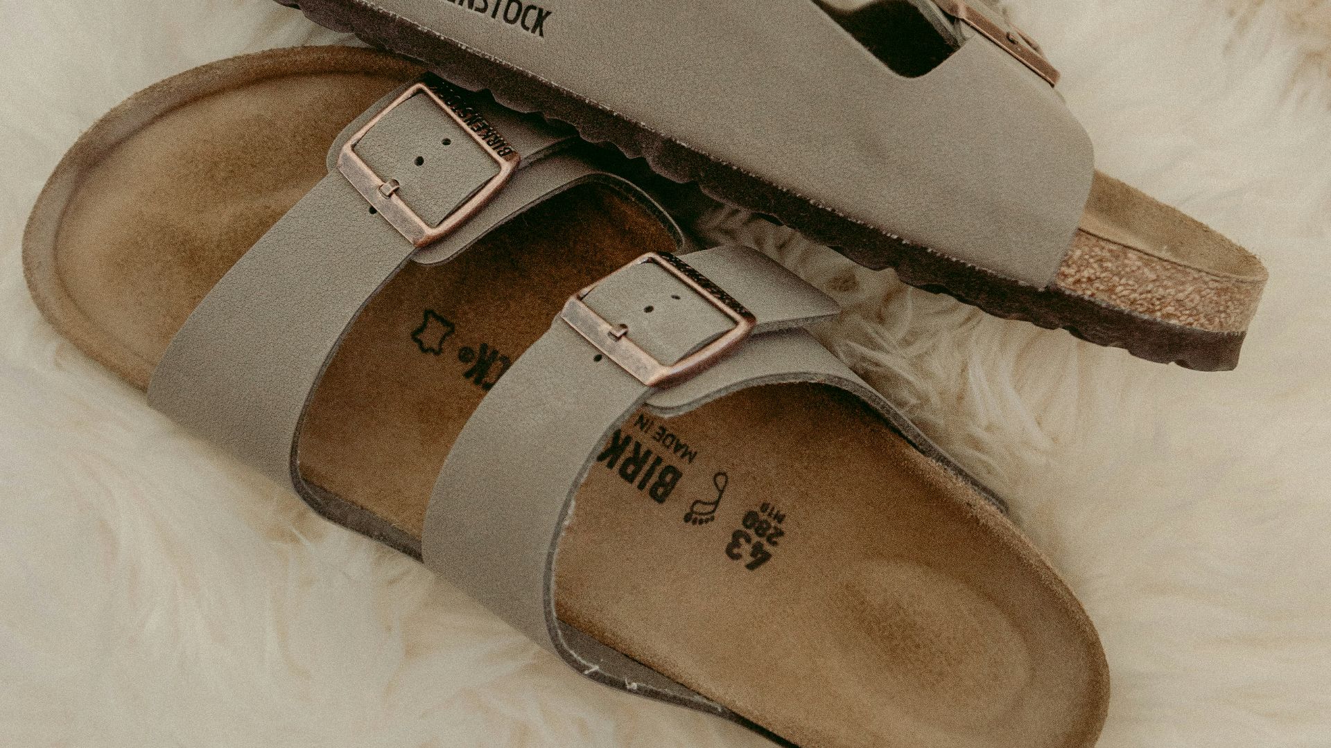 brown and gray slide sandals