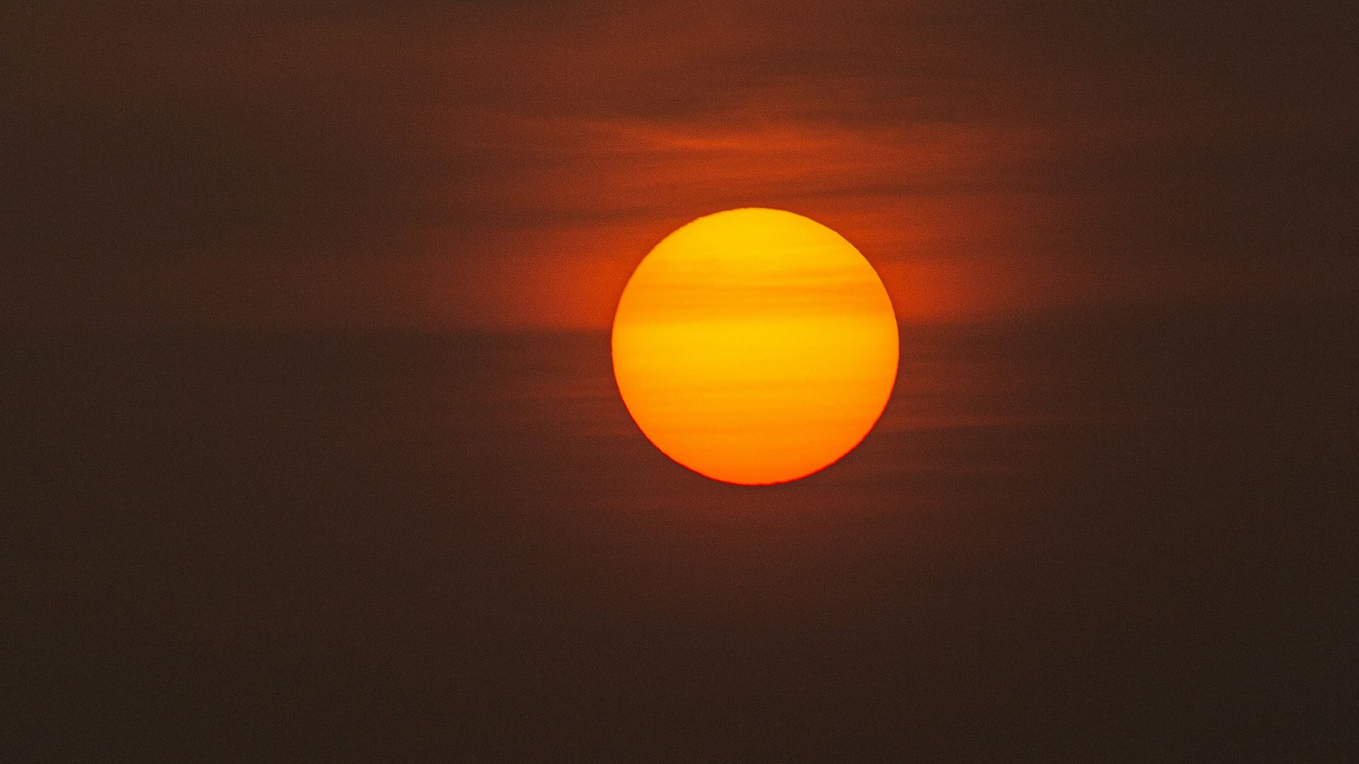low-light photo of sun