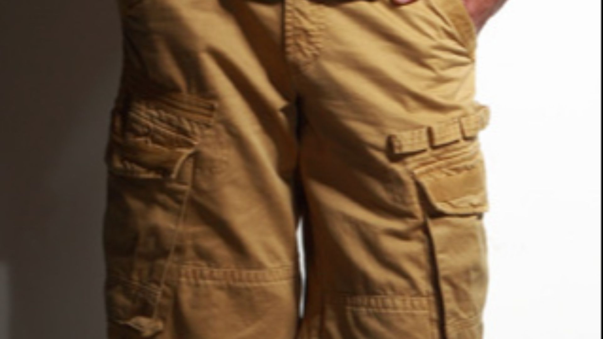 File:Man wearing a green T-shirt and cargo shorts (cropped).jpg