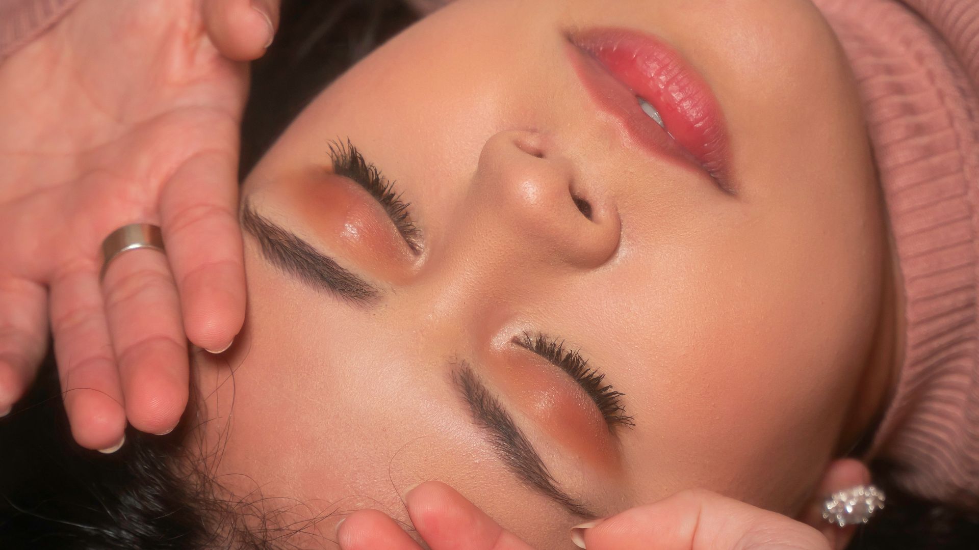 woman in pink knit sweater