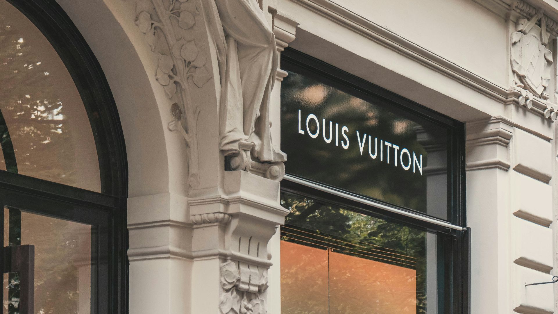 Louis Vuitton boutique signage on building