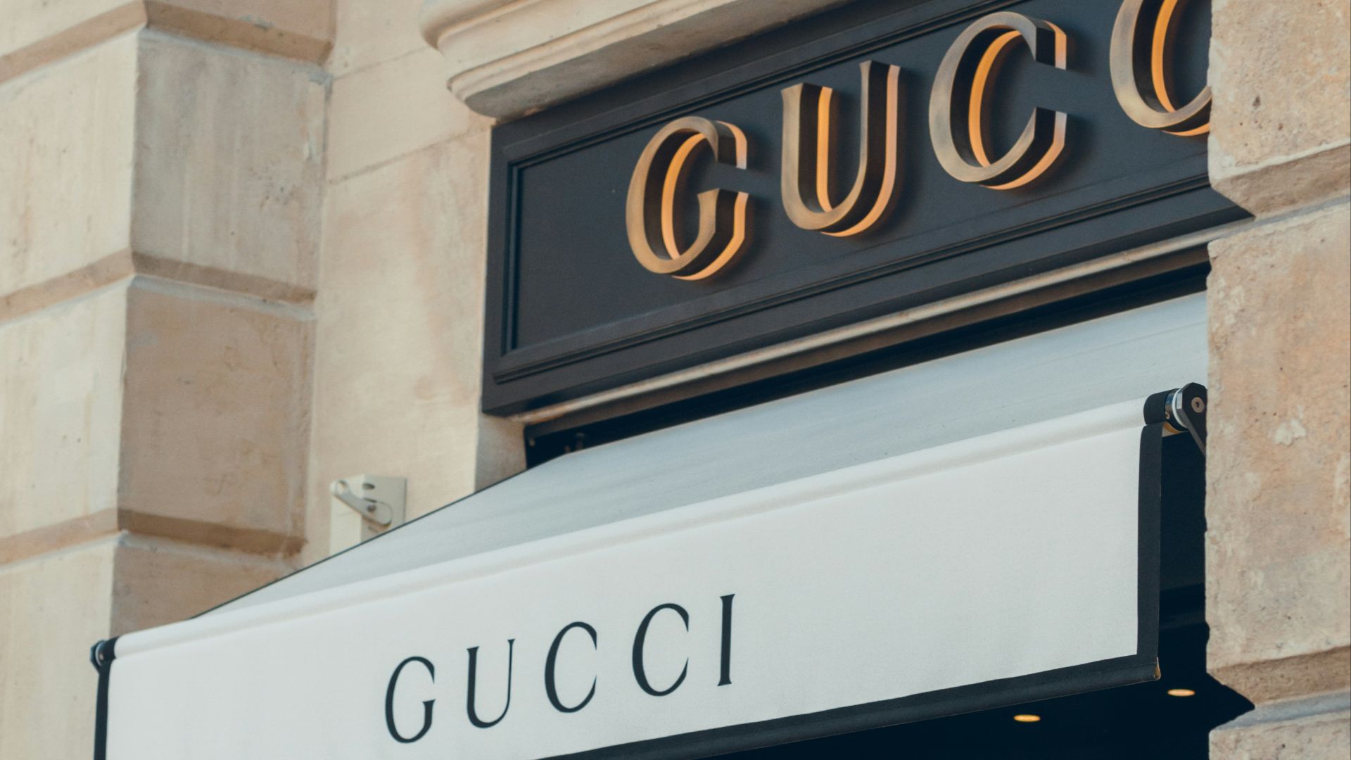 a building with a sign that says gucci