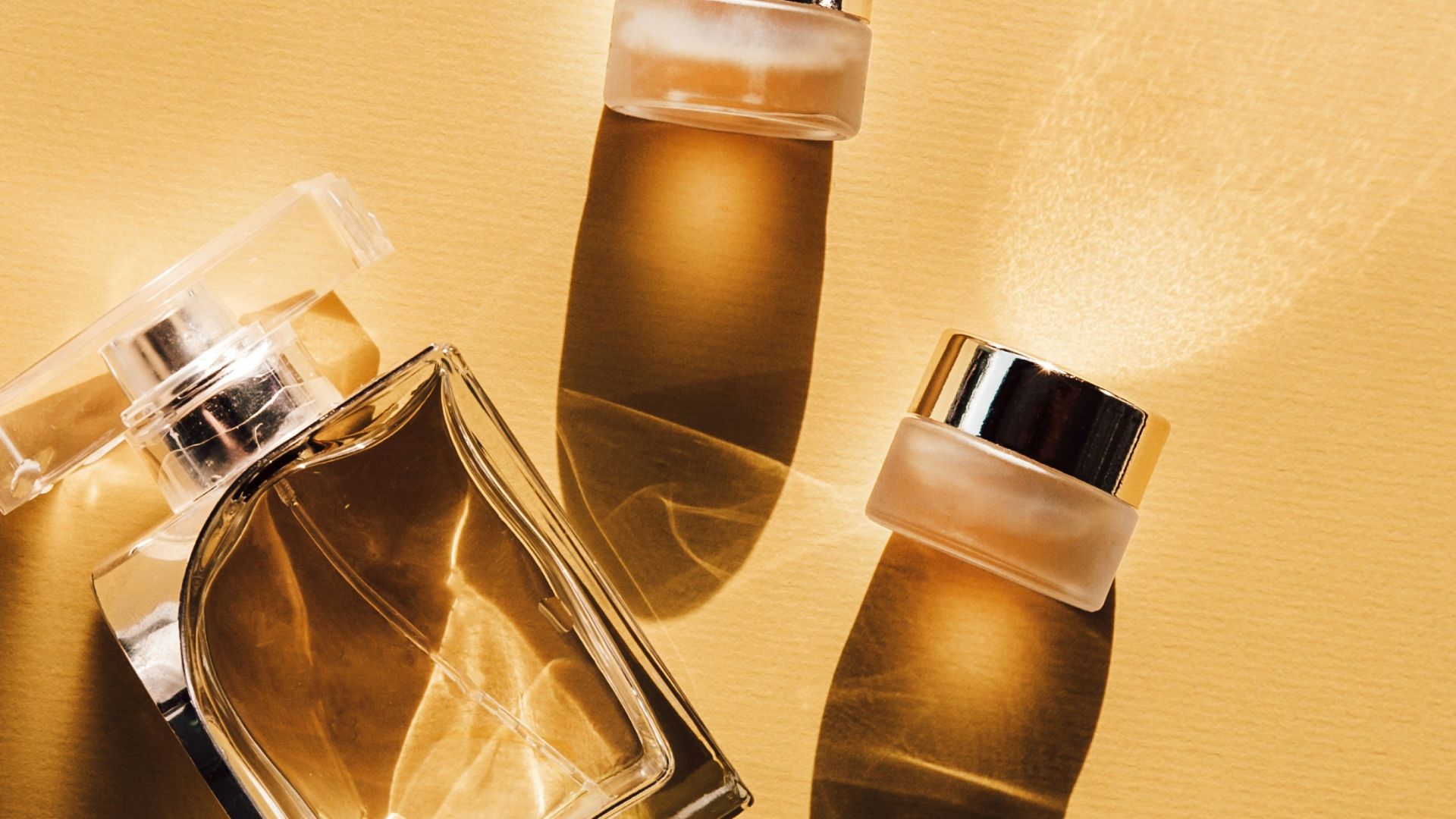 two clear glass perfume bottles