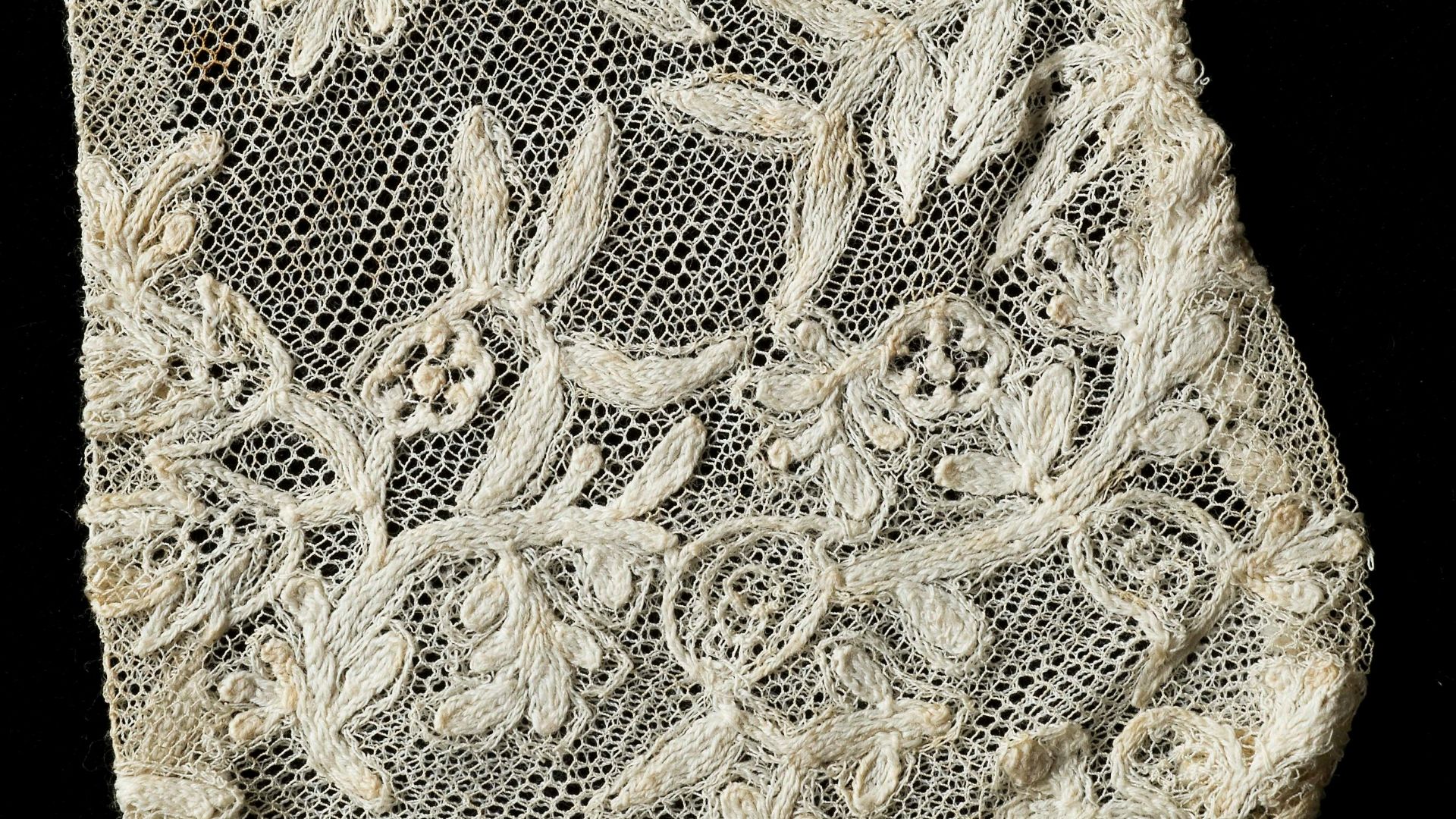 white and black floral textile