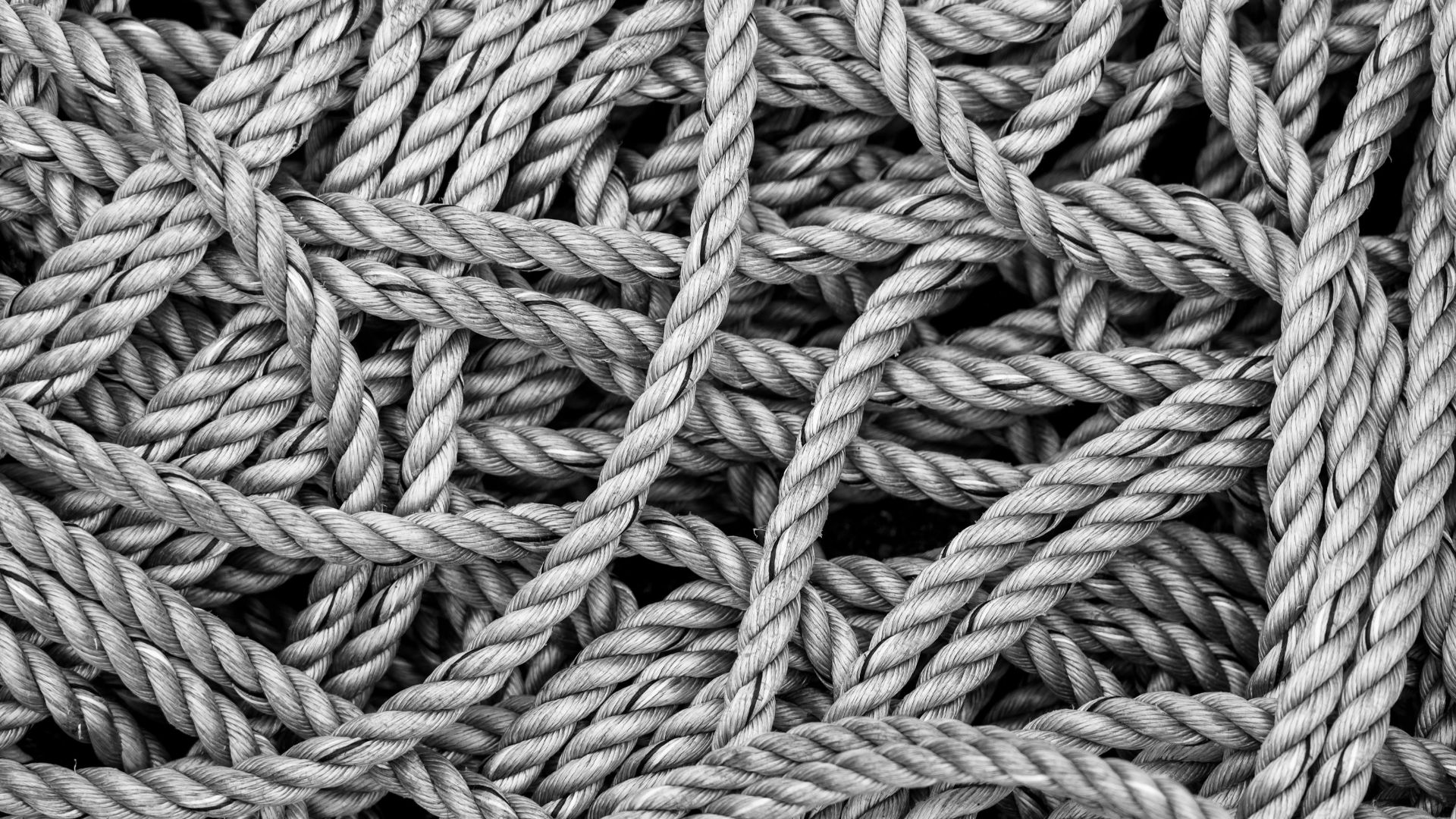 gray rope in grayscale photography