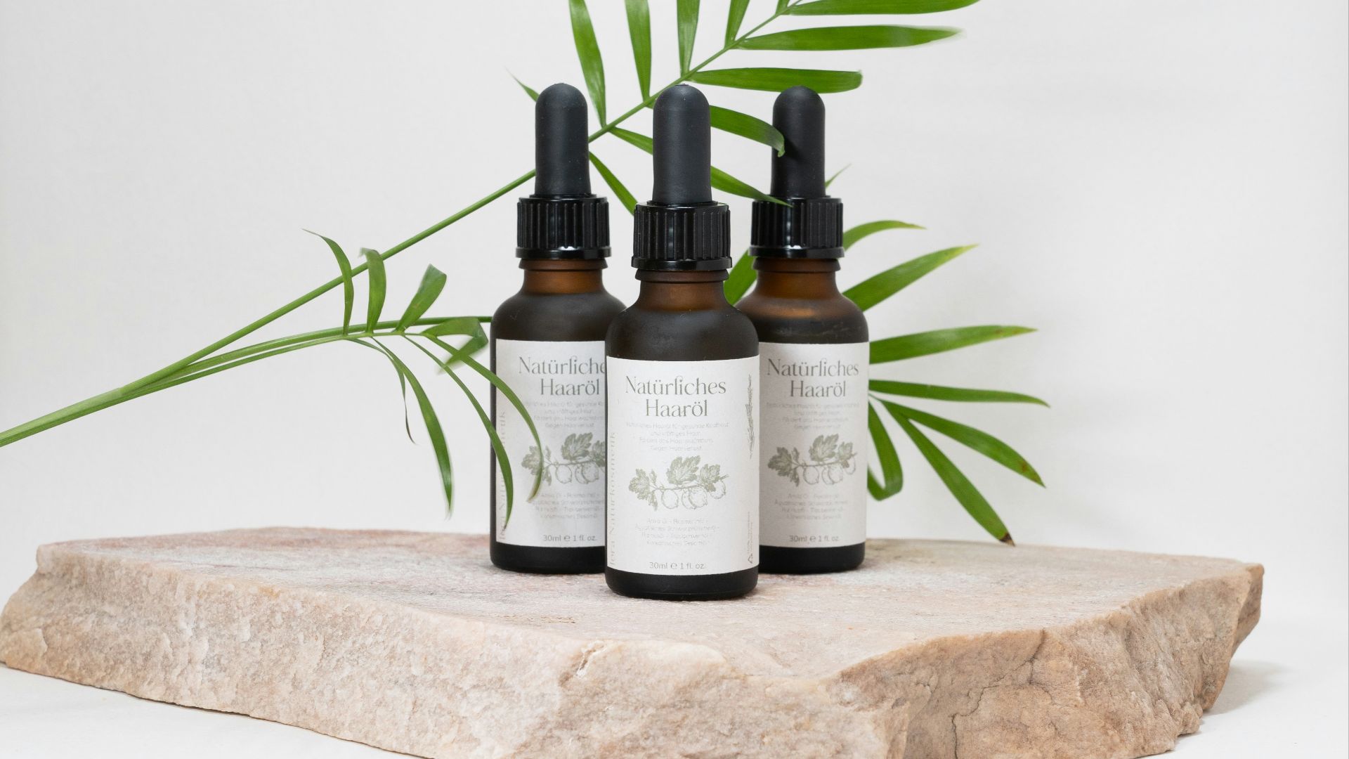 a group of bottles with liquid in them