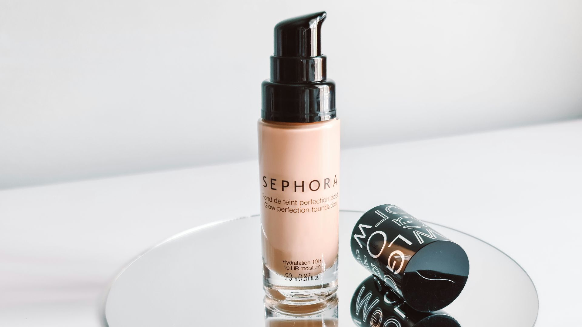 white and black spray bottle