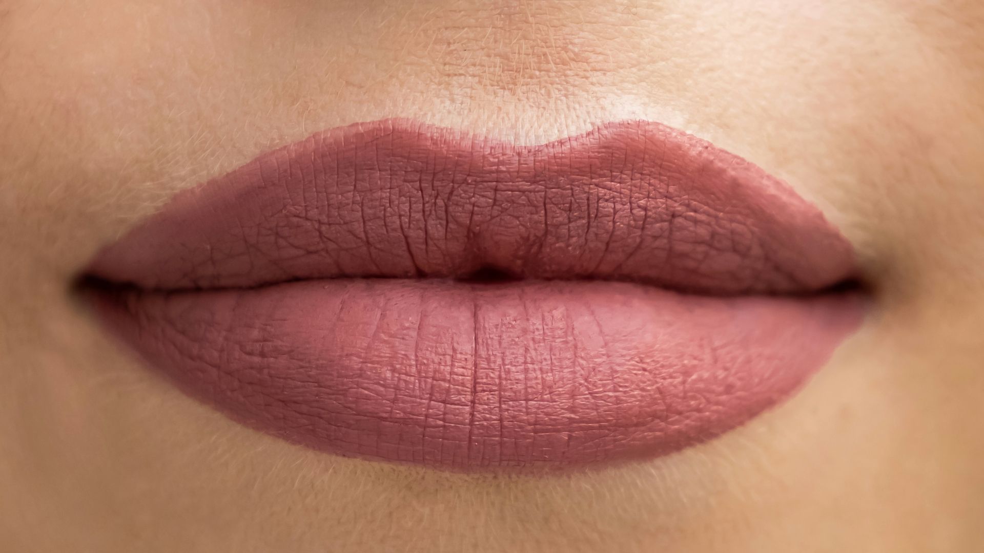 a close up of a woman's lips and nose