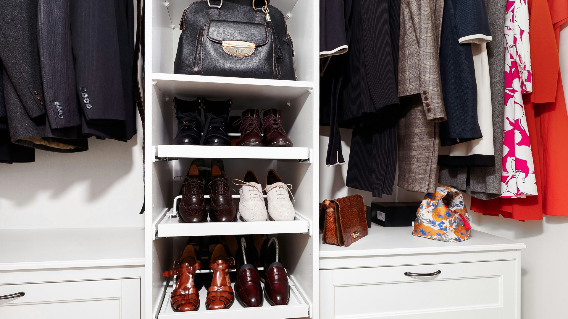 A closet with a lot of shoes and handbags