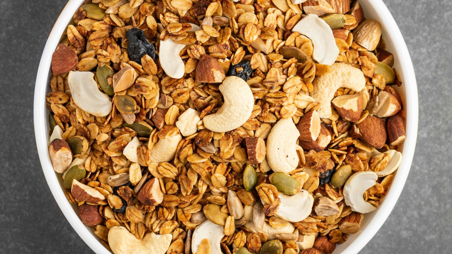 white ceramic bowl with brown nuts