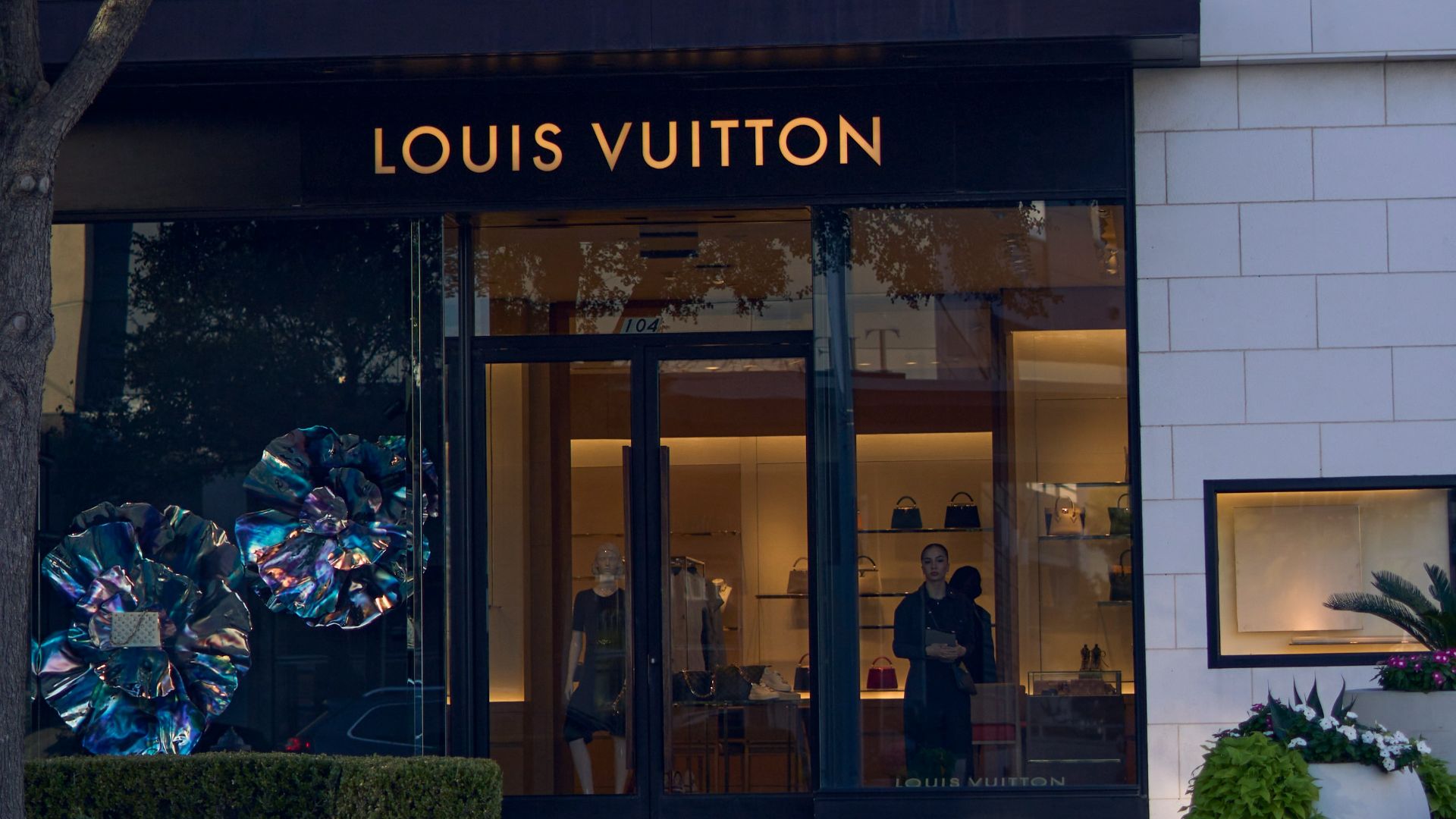 a building with a tree in the front