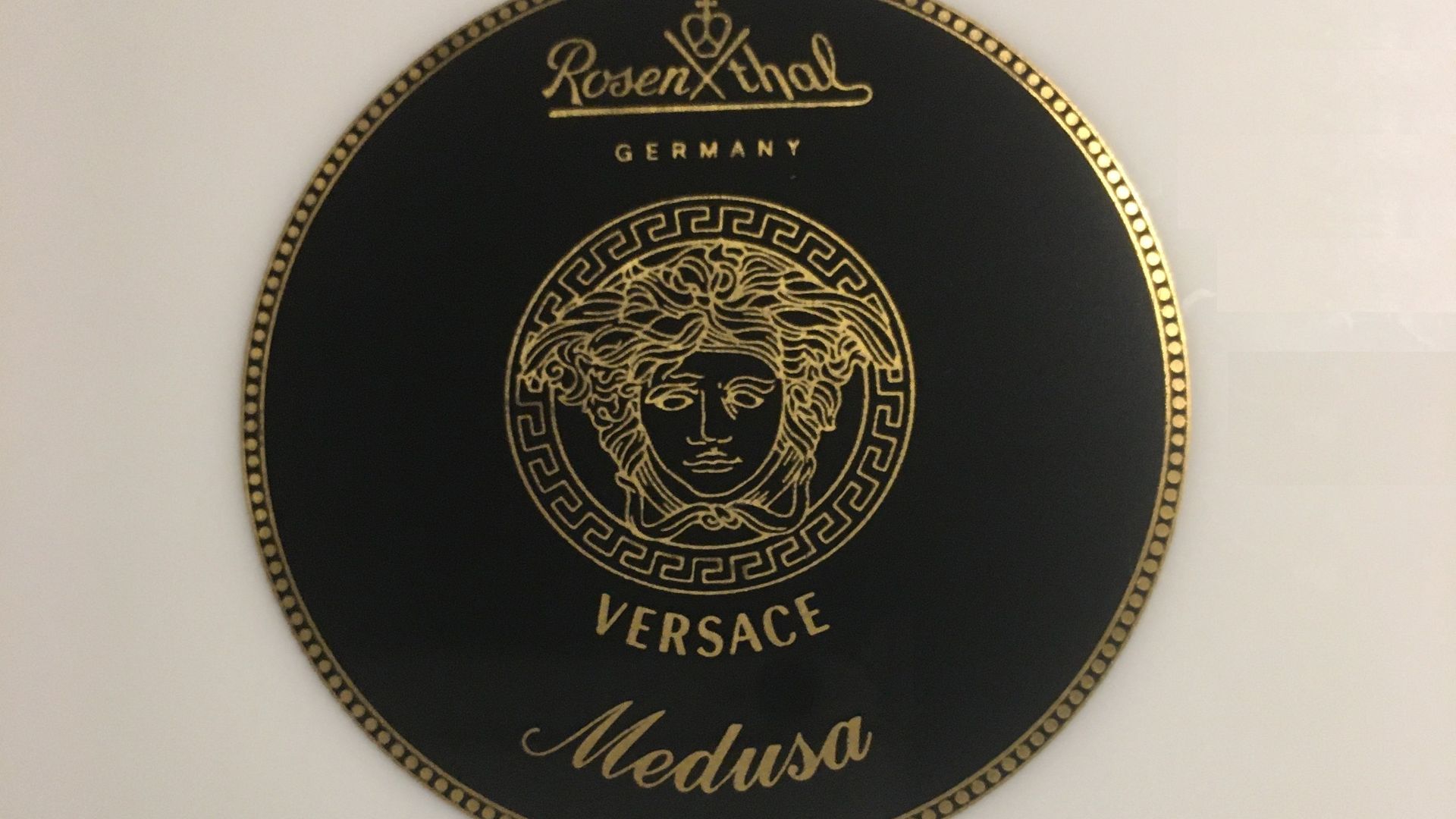 File:Logo of Versace-Rosenthal cooperation on back of ashtray.jpeg
