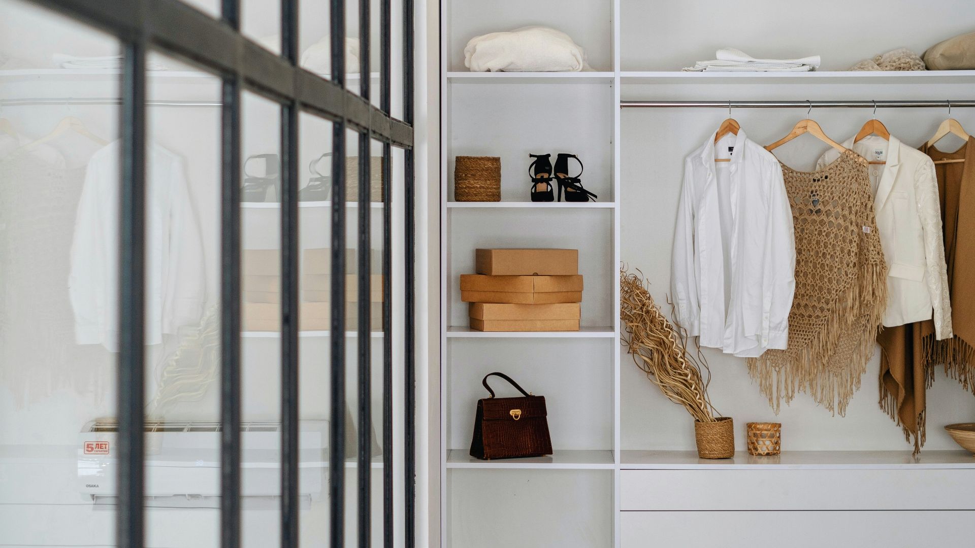white bath towel on white wooden cabinet