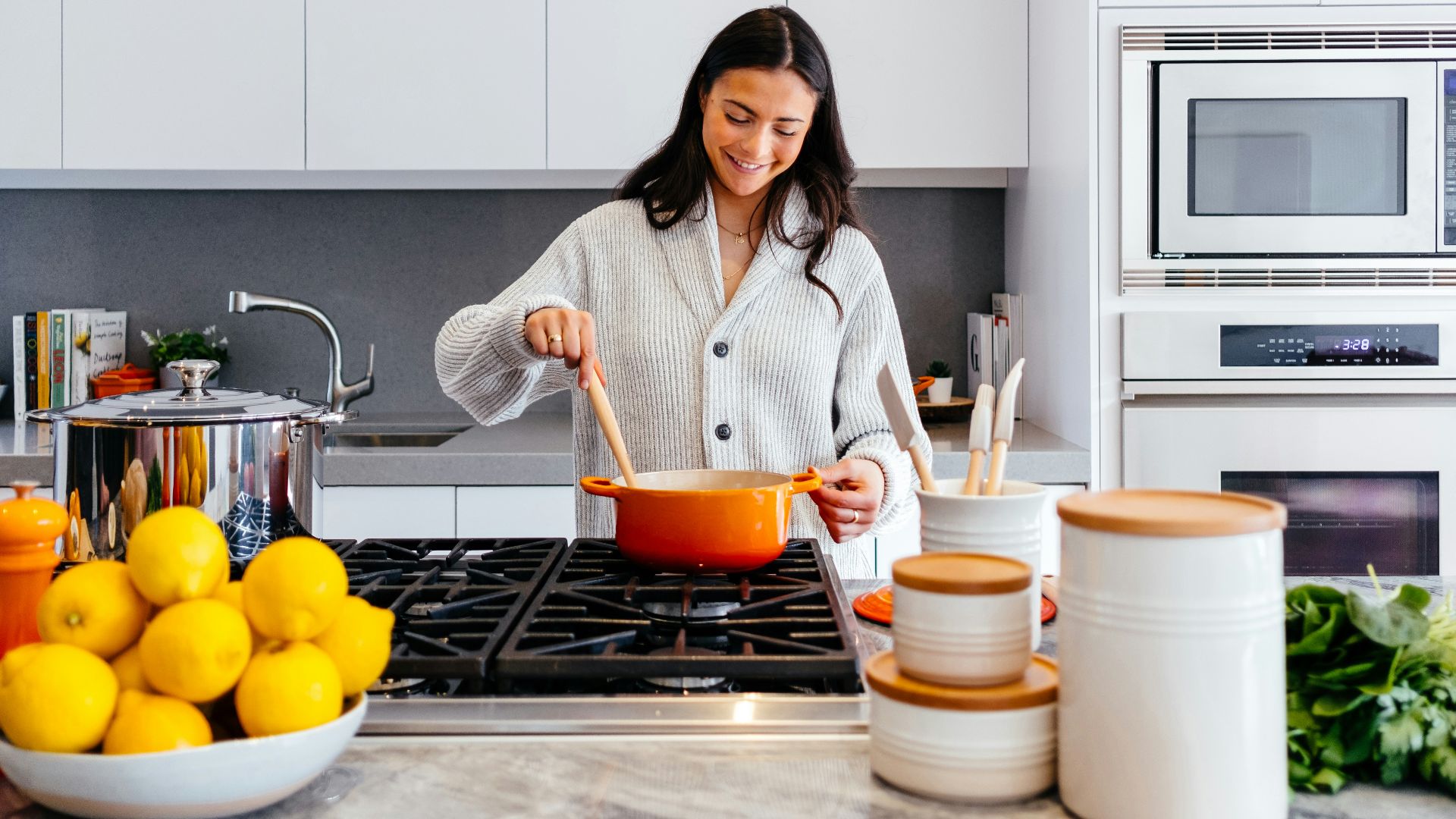 woman cooking inside kitchen room