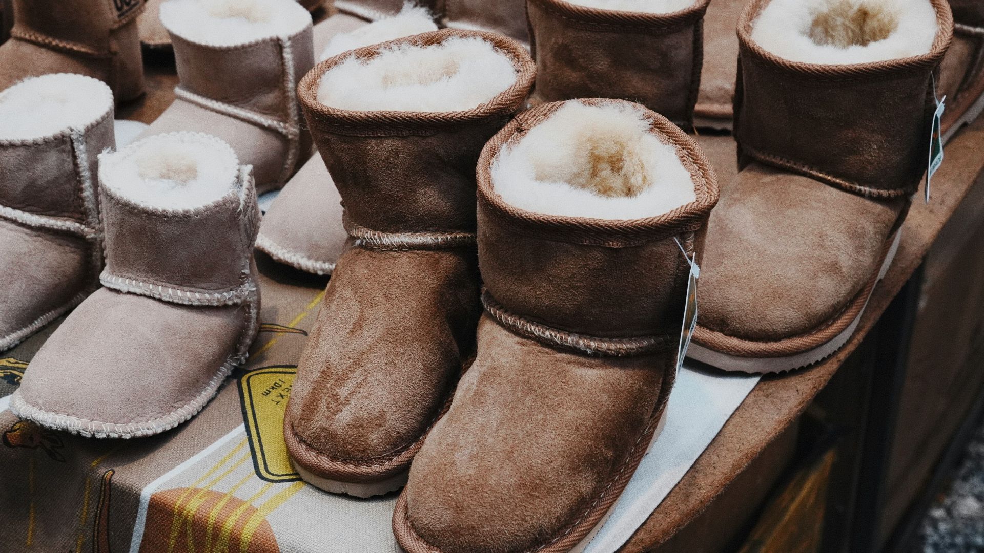 Many warm and cozy winter boots are displayed.