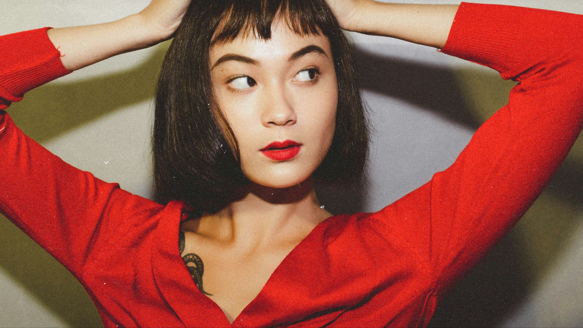 woman in red v neck shirt