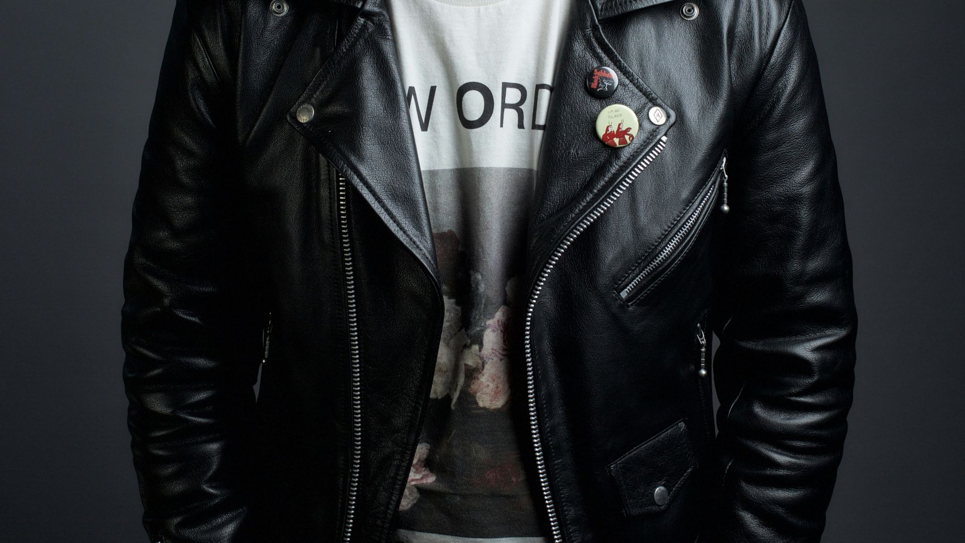 man in black leather jacket