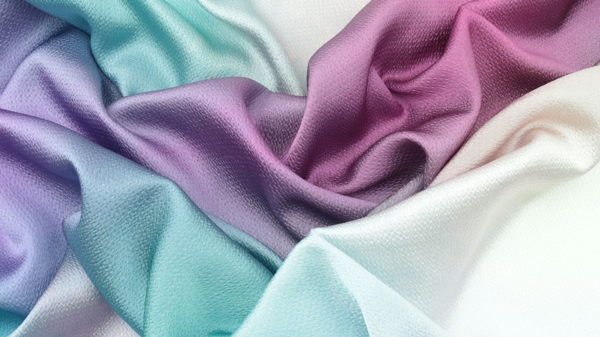 blue textile on white textile