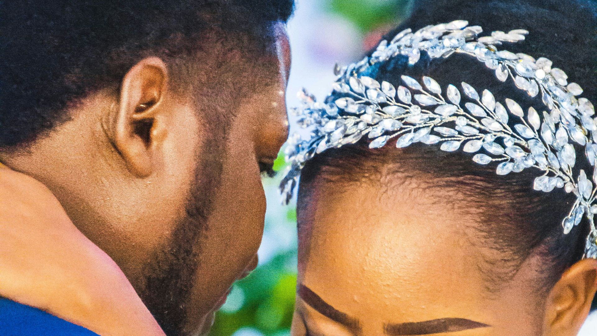 a man kissing a woman