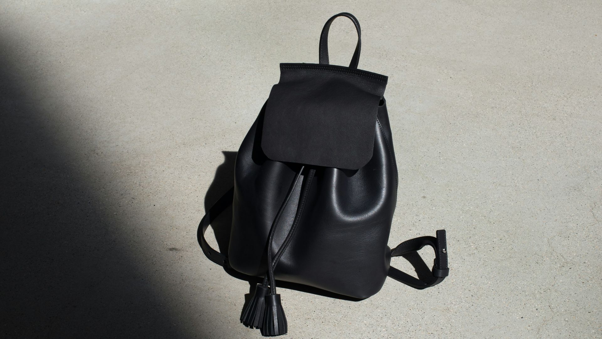 black leather bucket bag