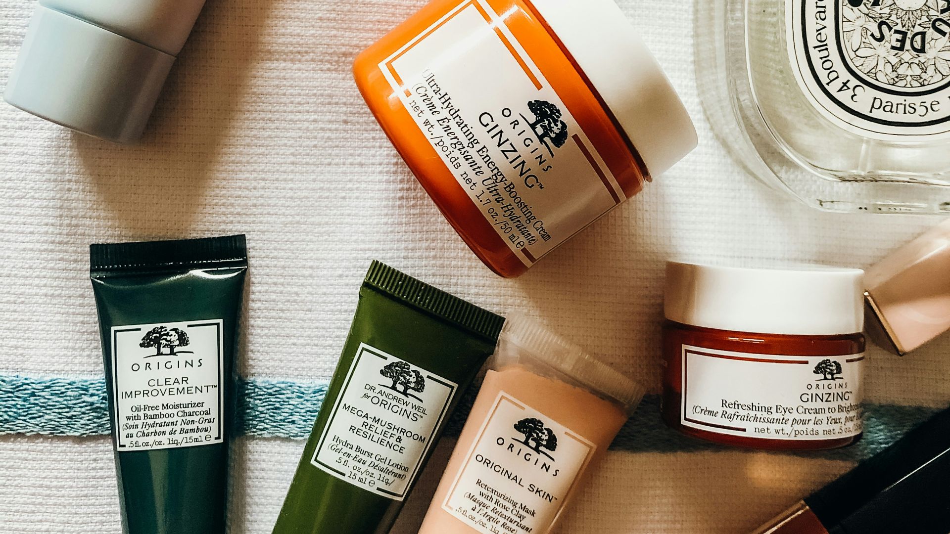 white and orange plastic bottle