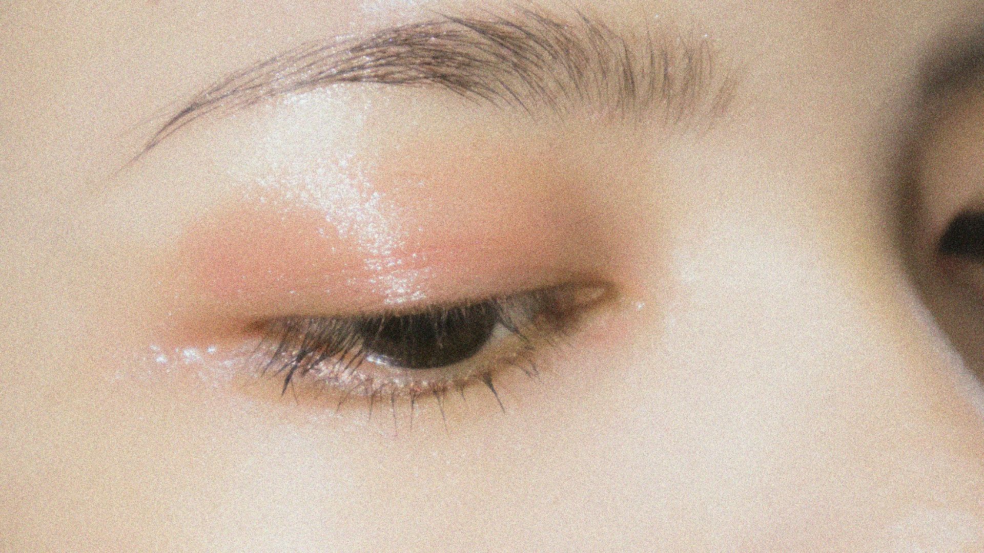 a close up of a woman's eye with makeup