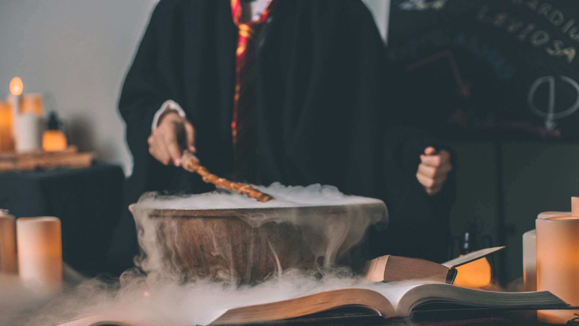 person holding wand on top of bowl