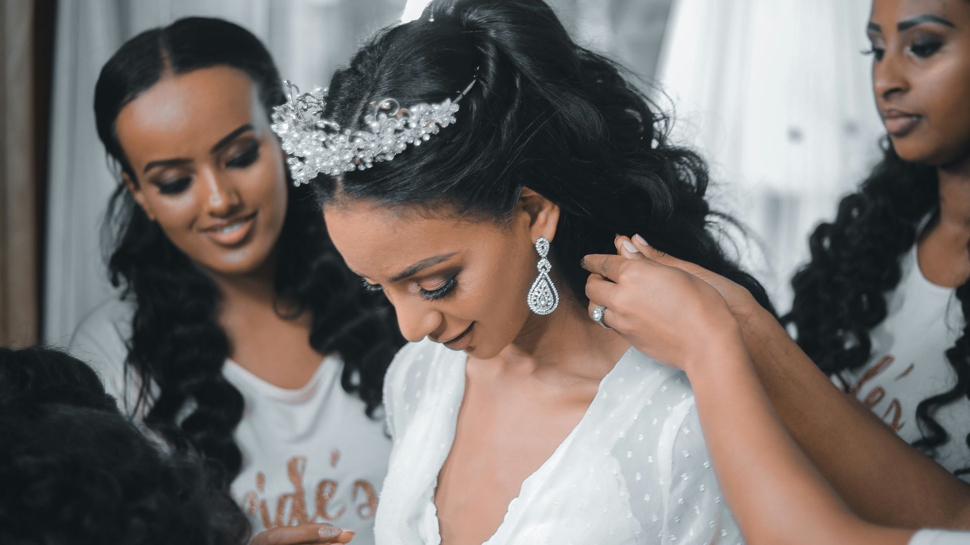 woman in white lace dress smiling