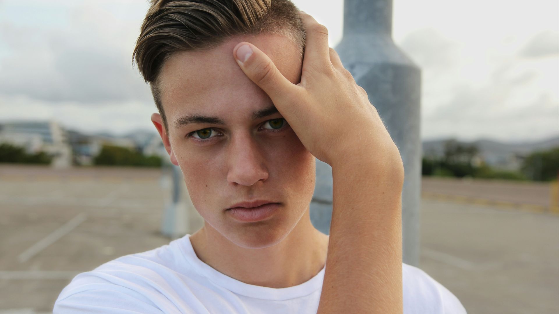 men's white crew-neck top close-up photography