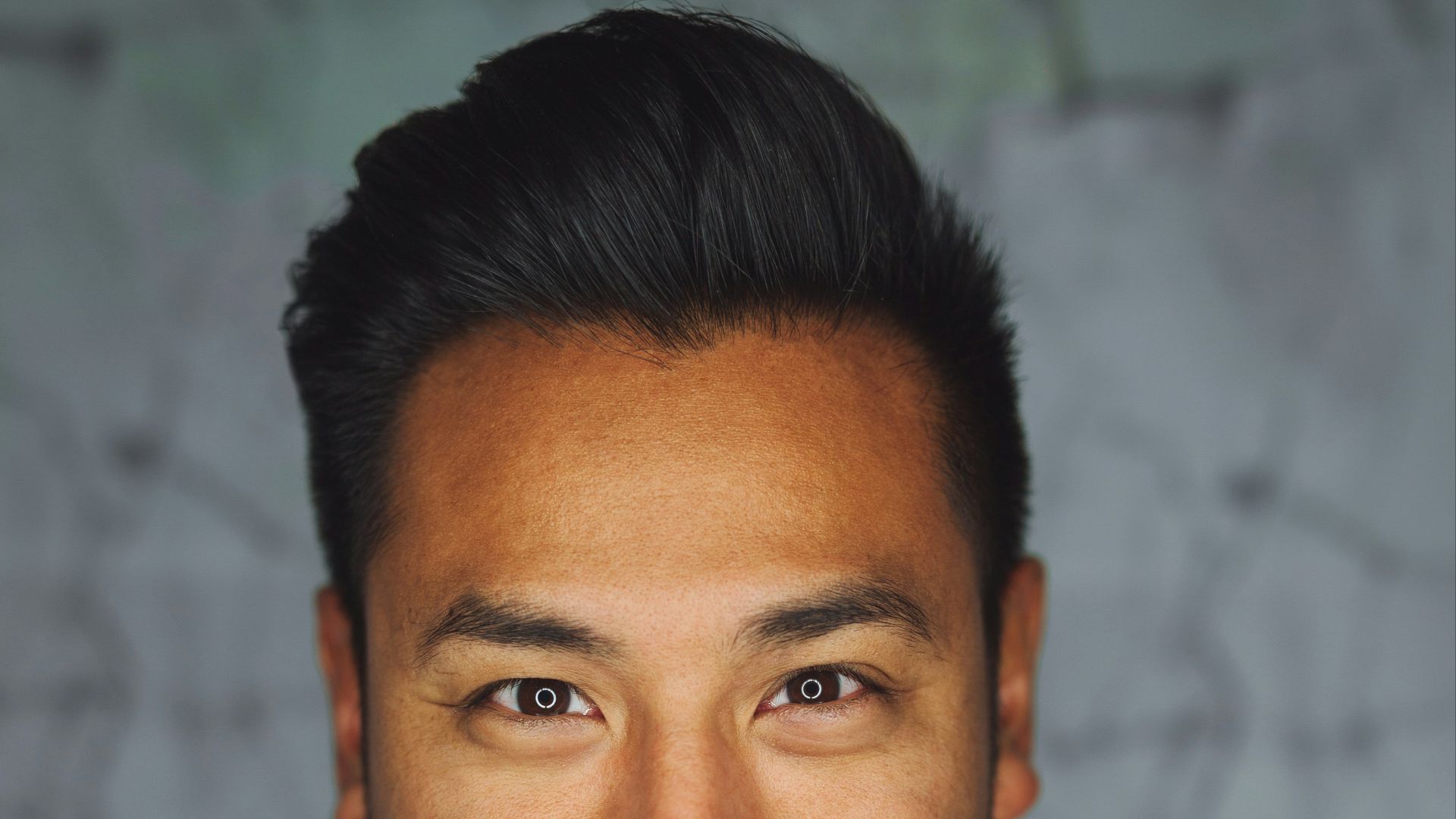 man wearing white V-neck shirt