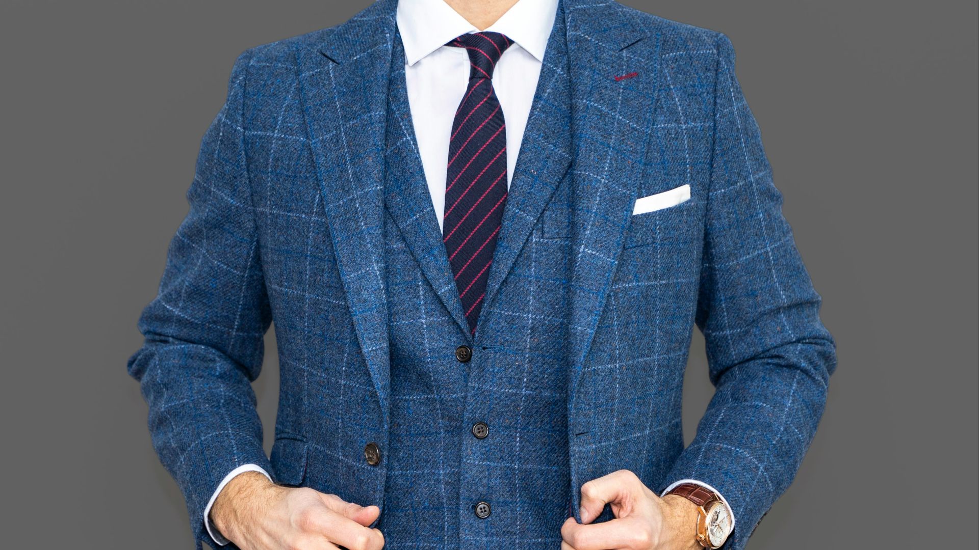 man in blue suit jacket