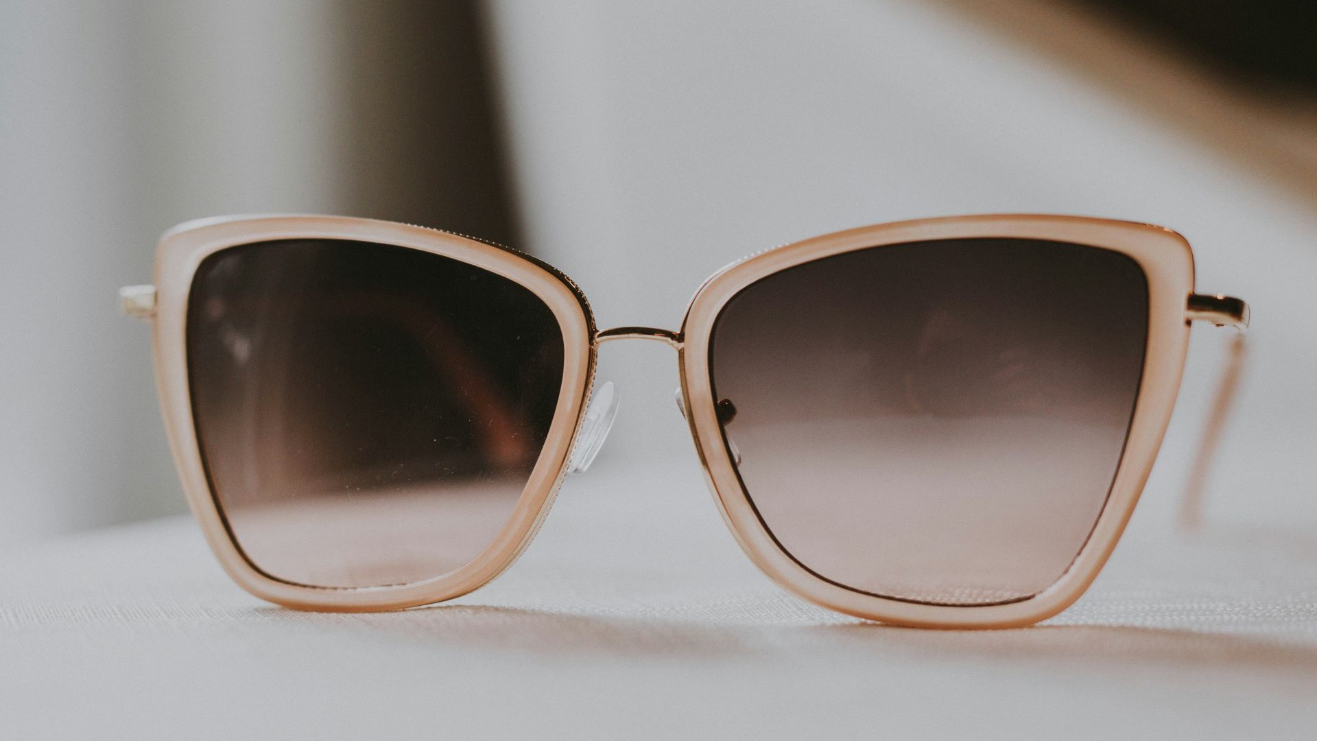 gray sunglasses with white frames