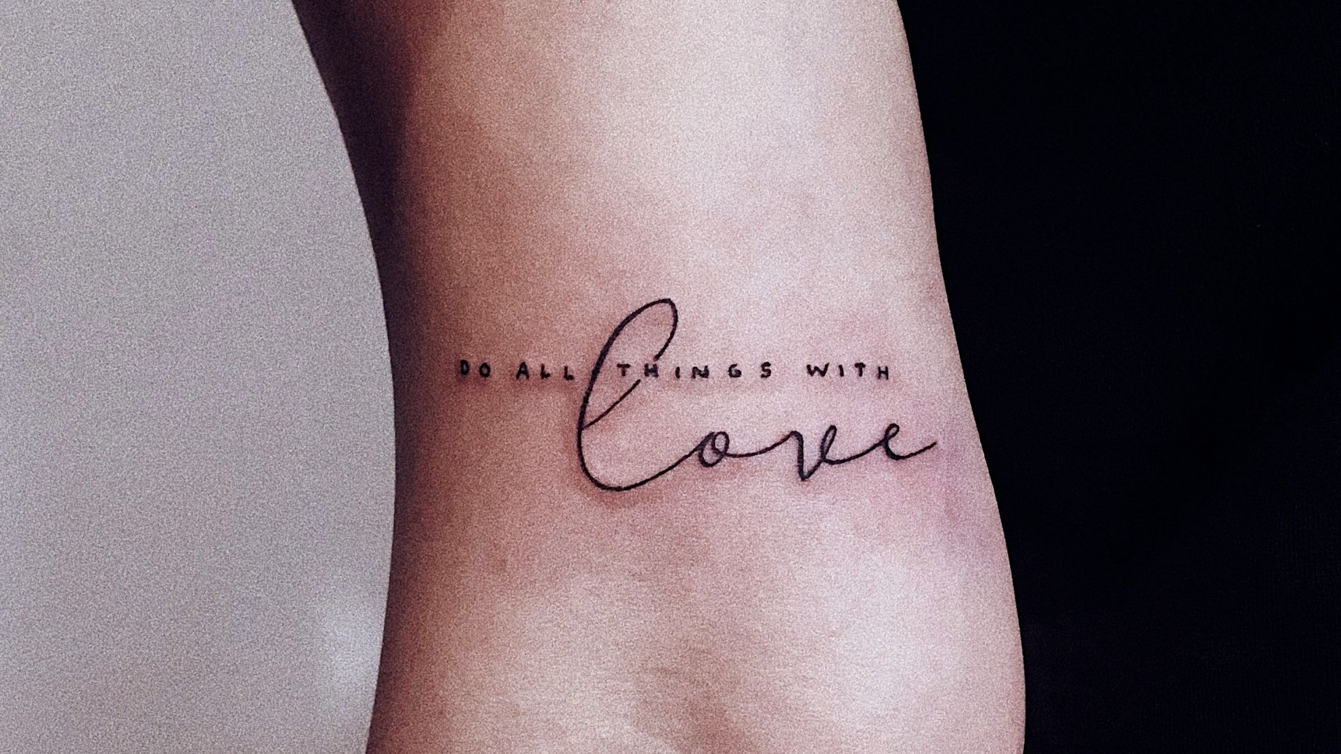 grayswash arm tattoo