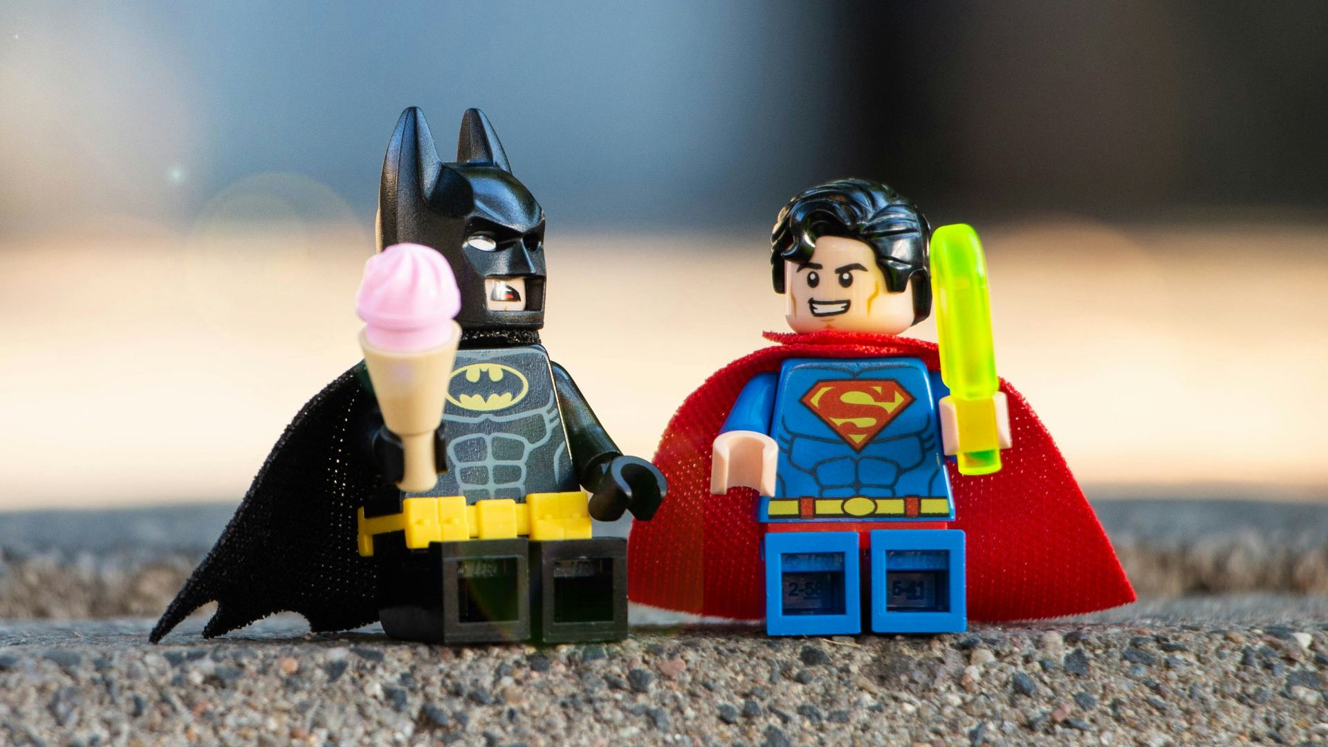 lego mini figure on brown sand