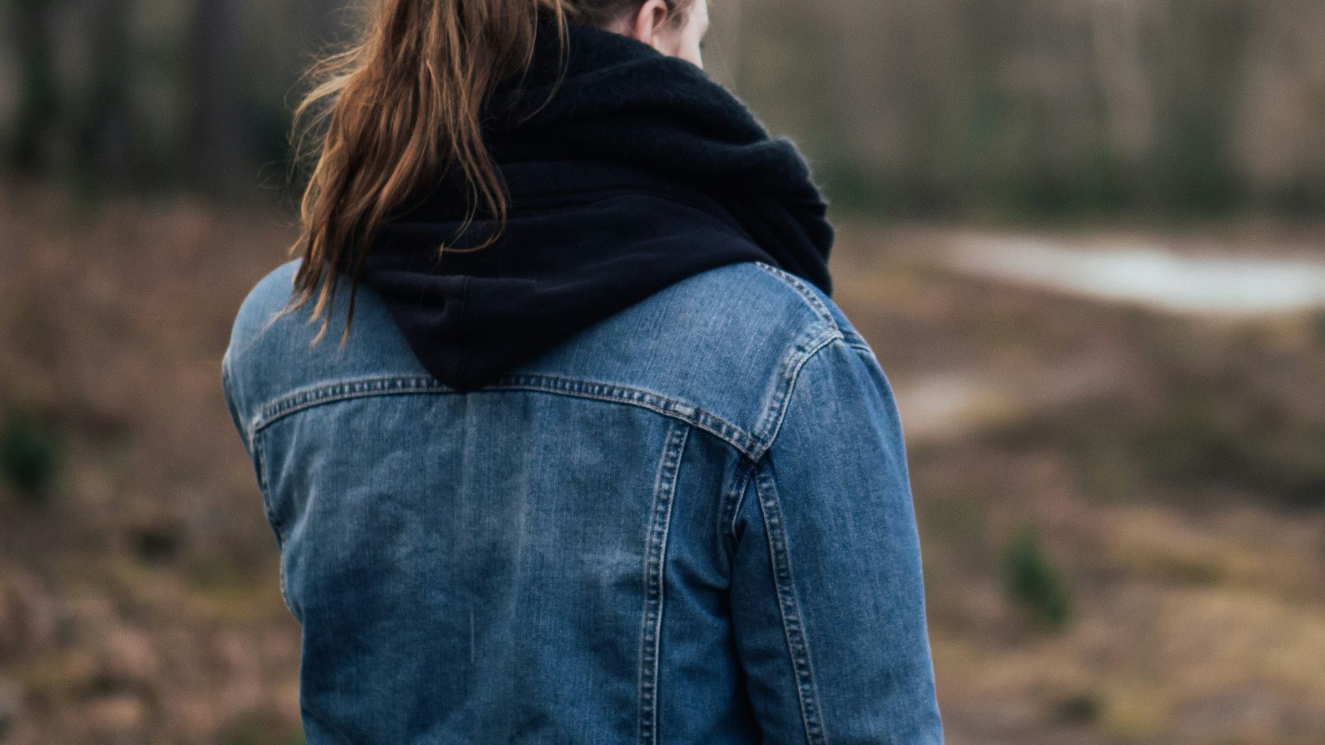 woman in blue denim jacket