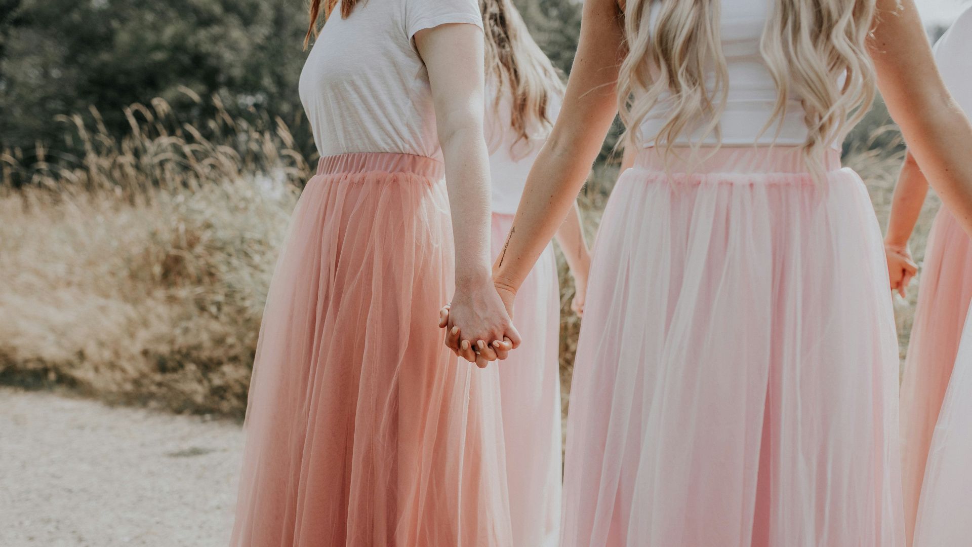 woman in white and pink dress