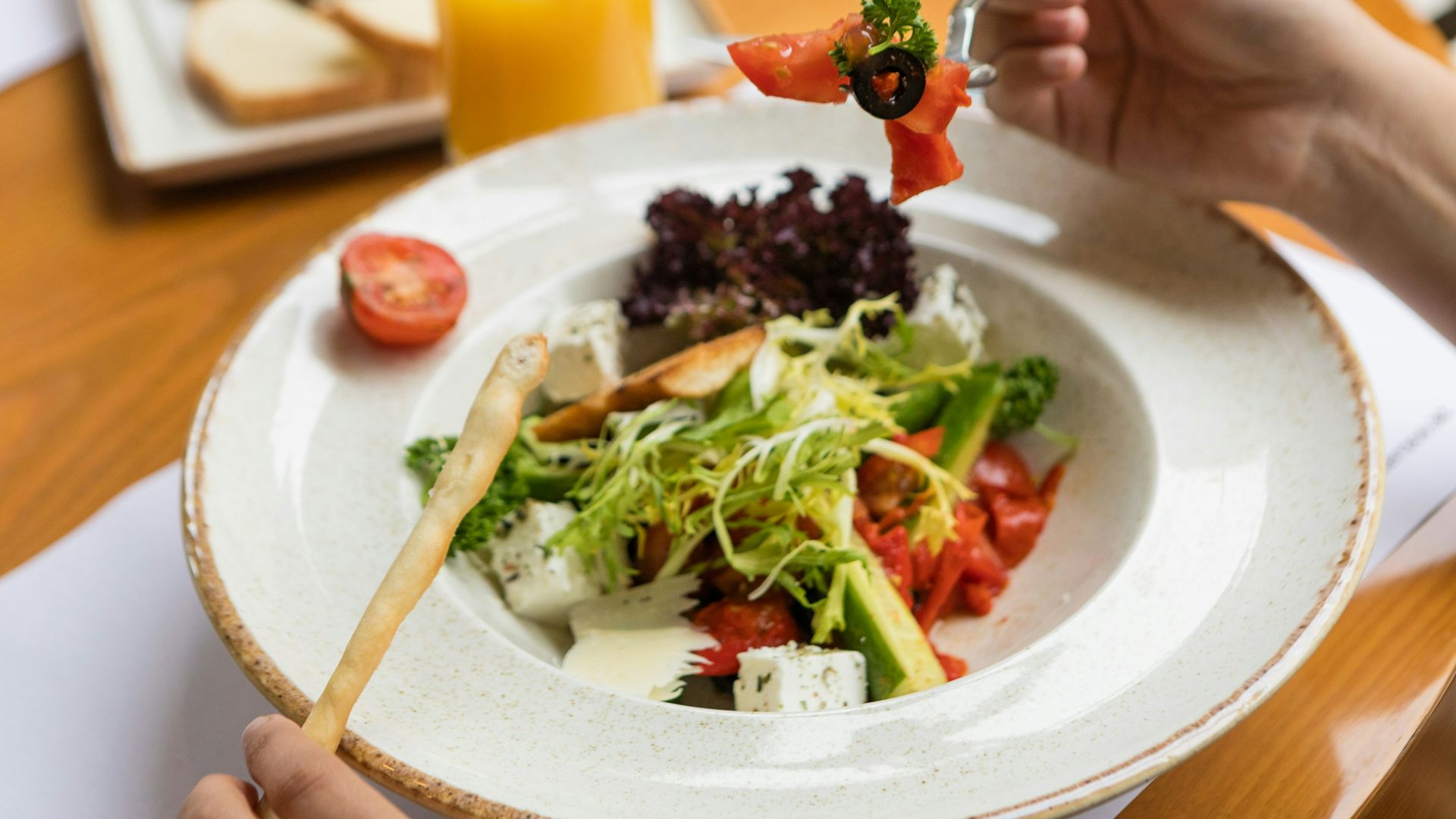 vegetable salad on white ceramic plate