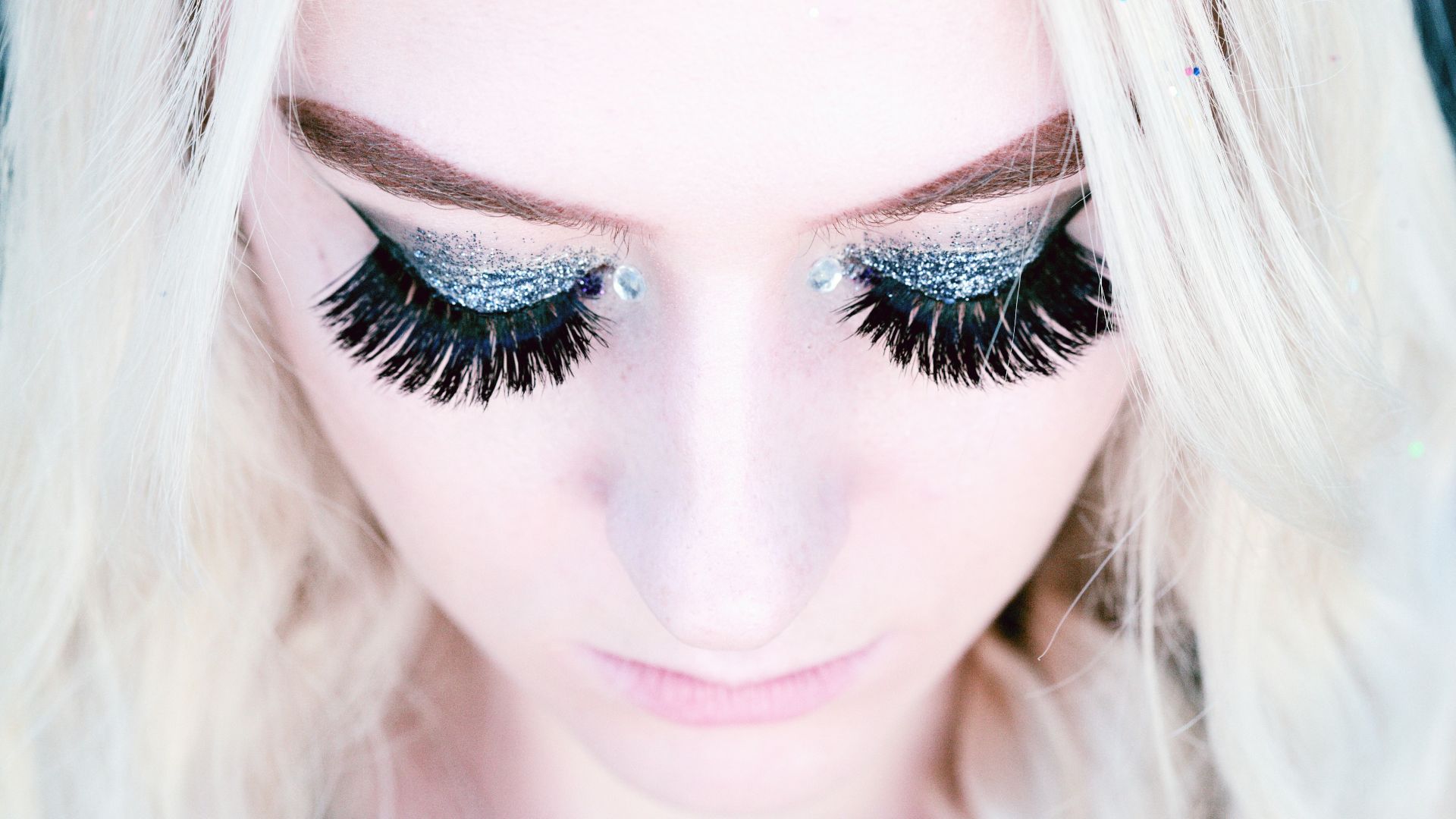 woman showing black eyelashes