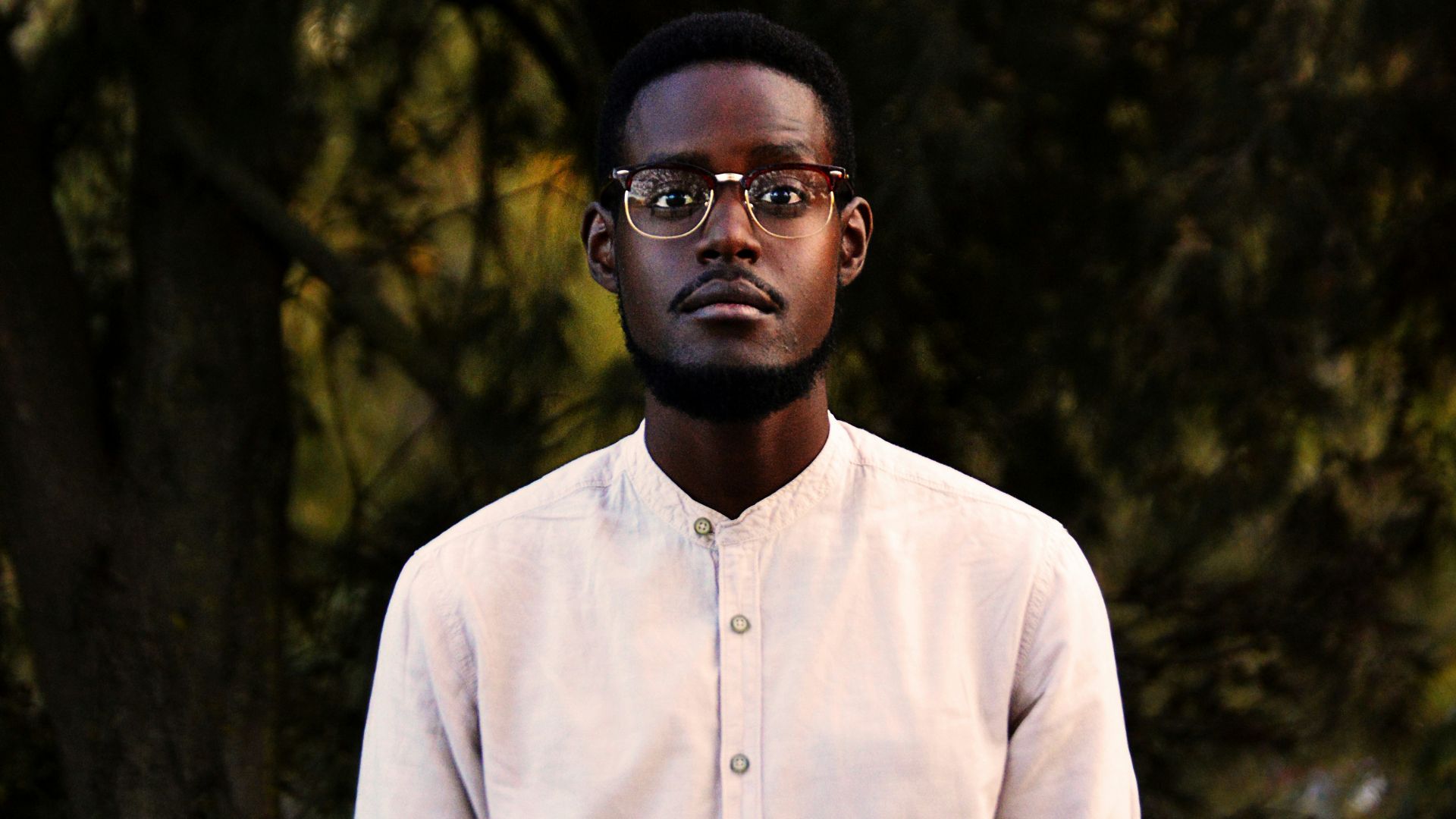 man wearing white button-up shirt