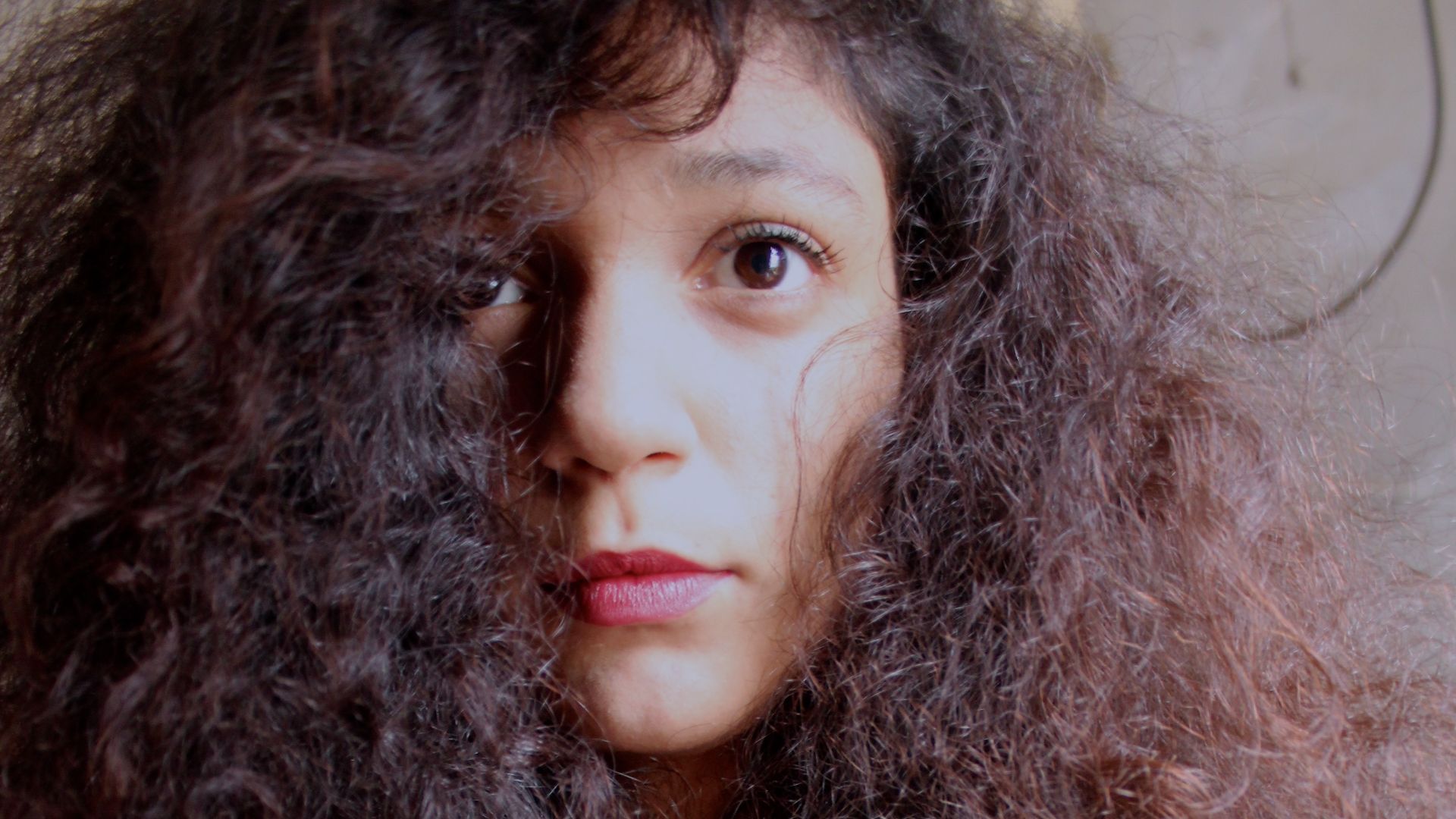 File:Cute girl with frizzy hair - cropped.jpg