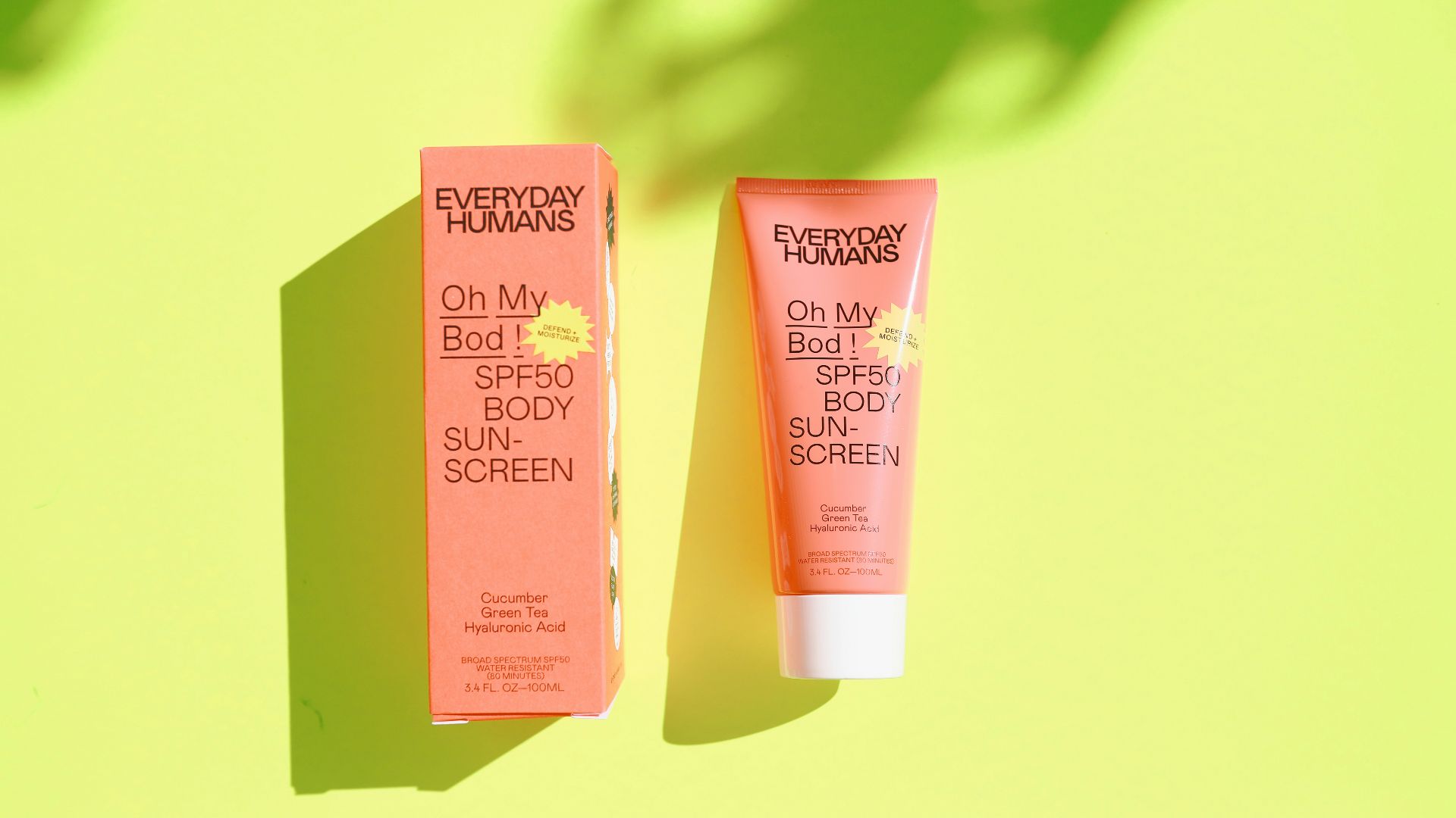 pink and white plastic tube bottle