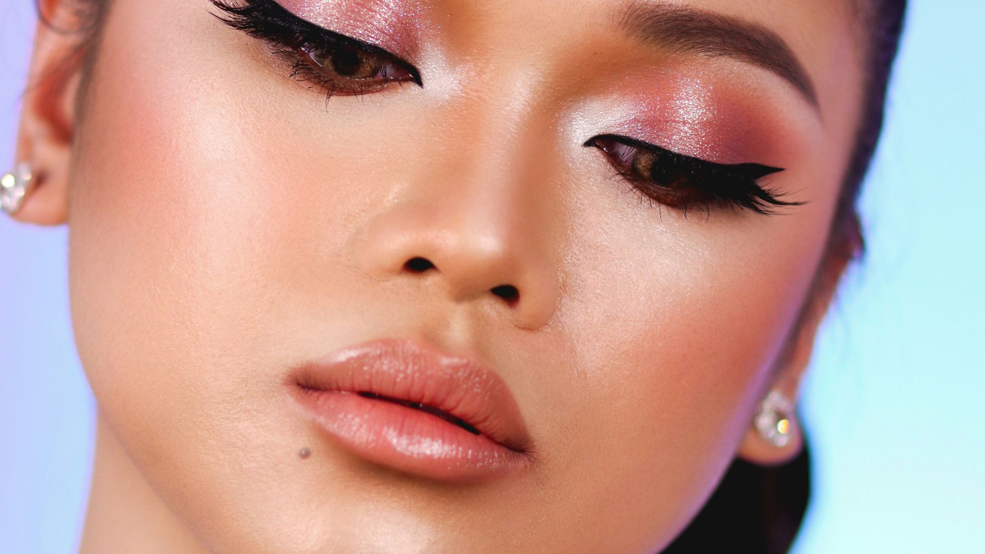 woman with pink lipstick and white shirt