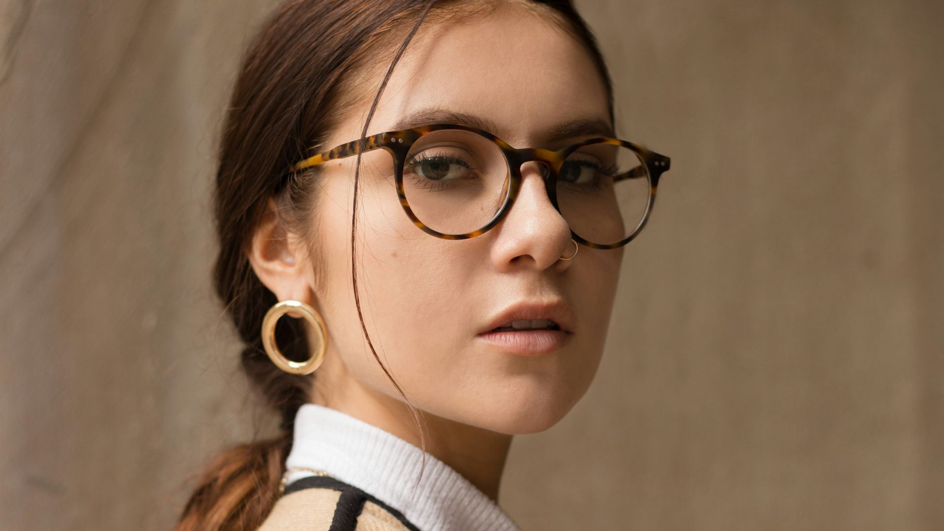 woman wearing brown and black coat