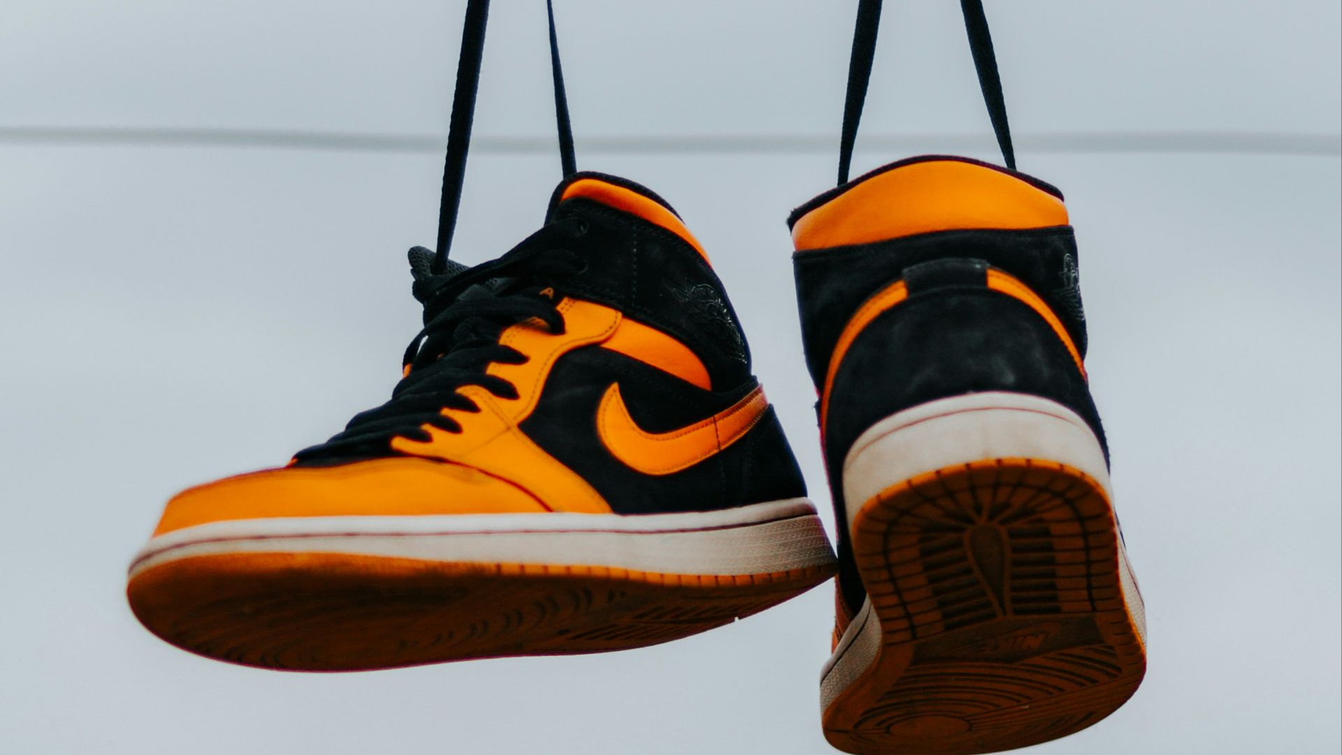 black and orange nike sneakers