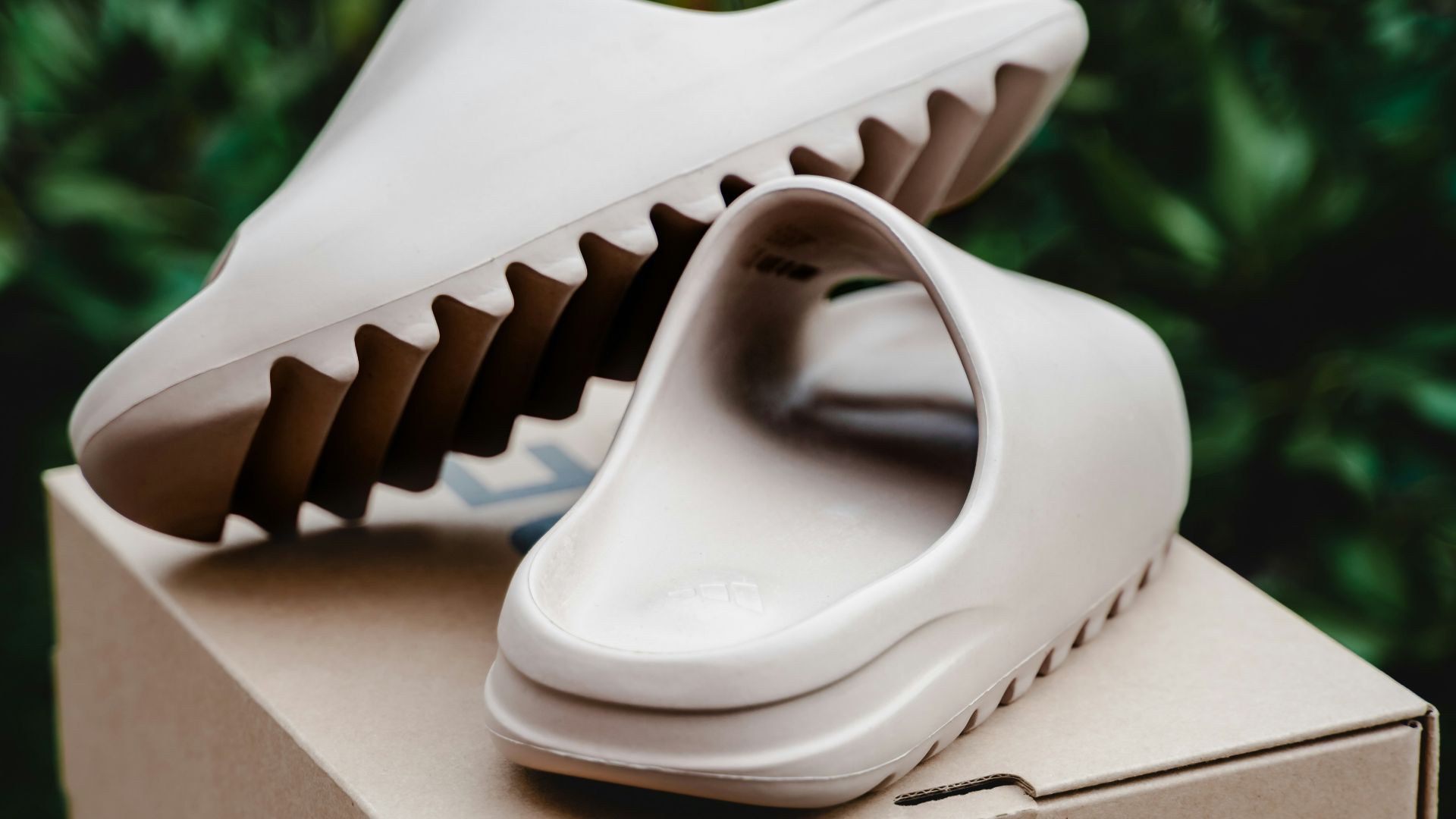 white ceramic shoe on brown cardboard box