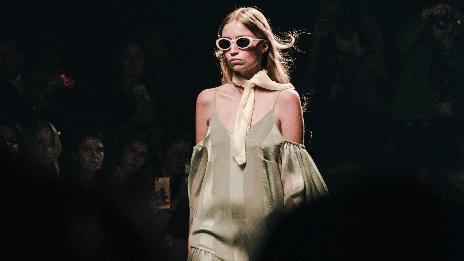 woman in white dress wearing sunglasses
