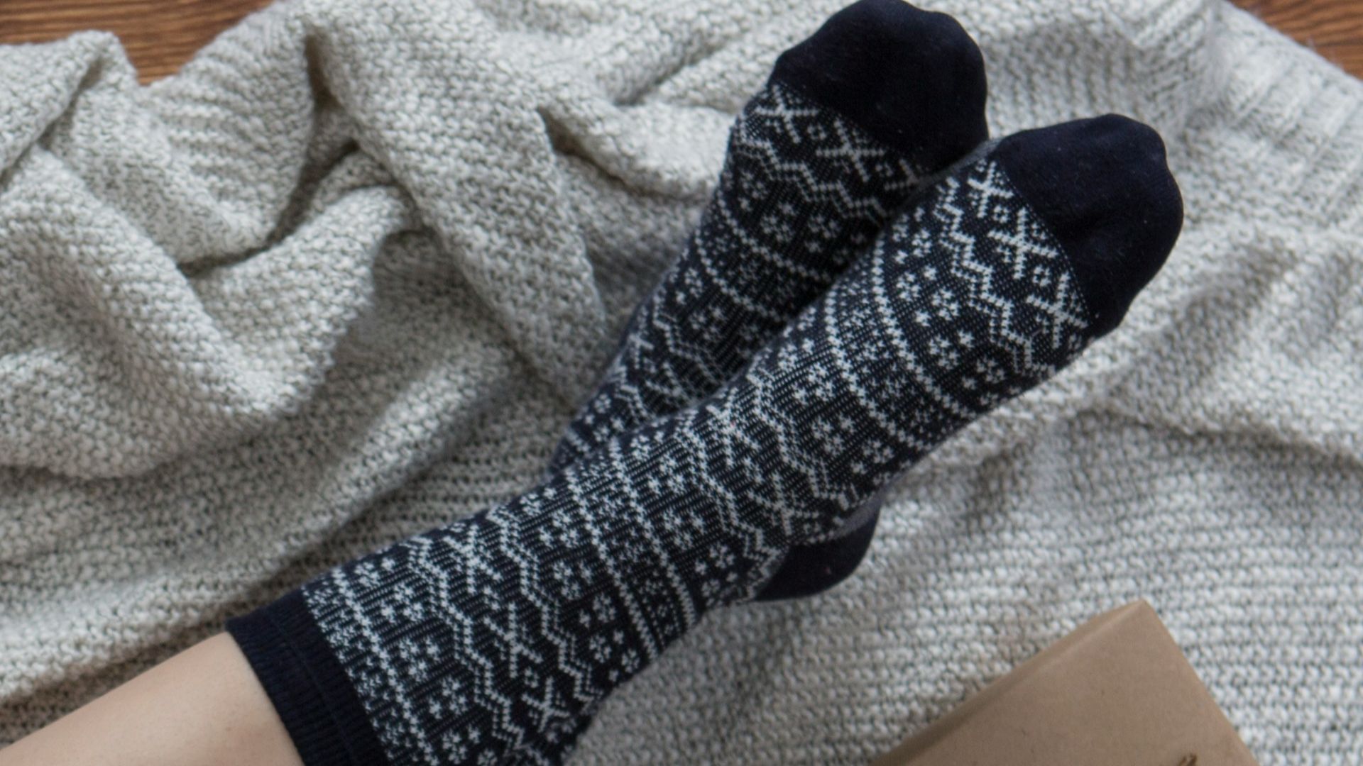 woman wearing gray and black socks