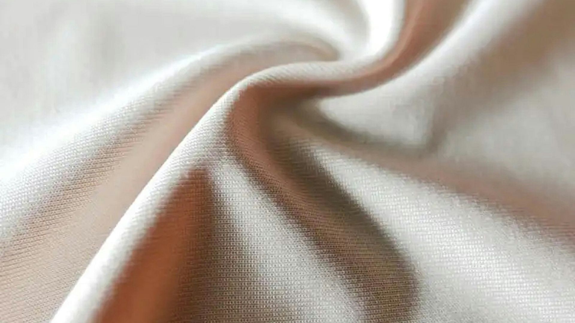 a close up view of a white fabric